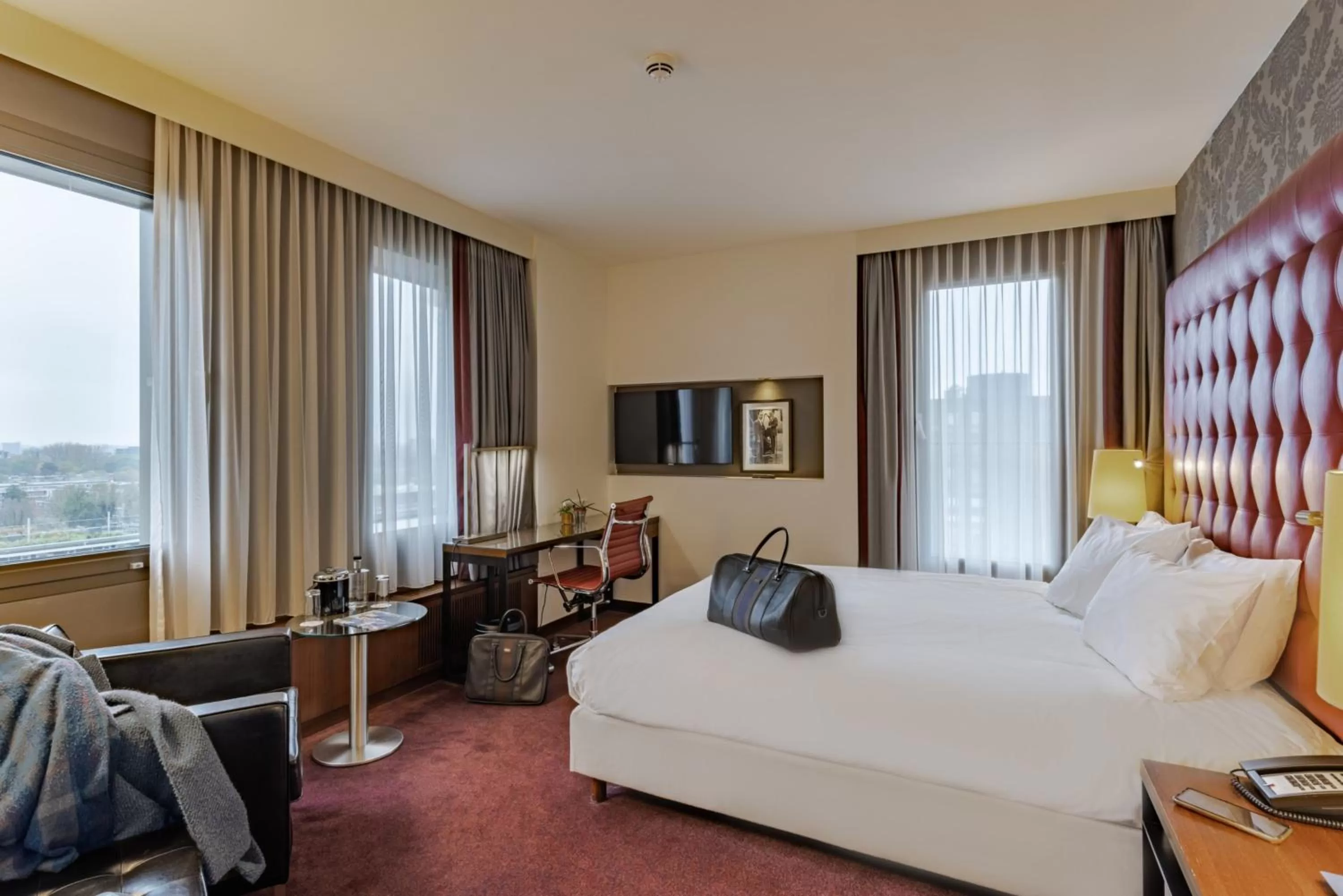 Photo of the whole room, Bed in Crowne Plaza Amsterdam - South by IHG