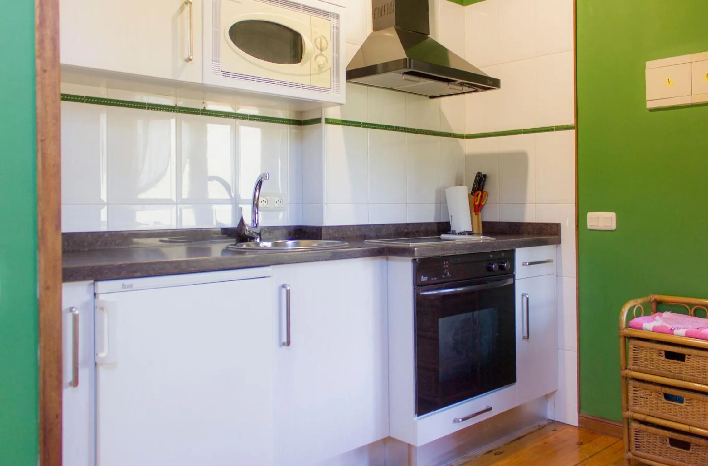 Kitchen or kitchenette in Viviendas Rurales El Covaju