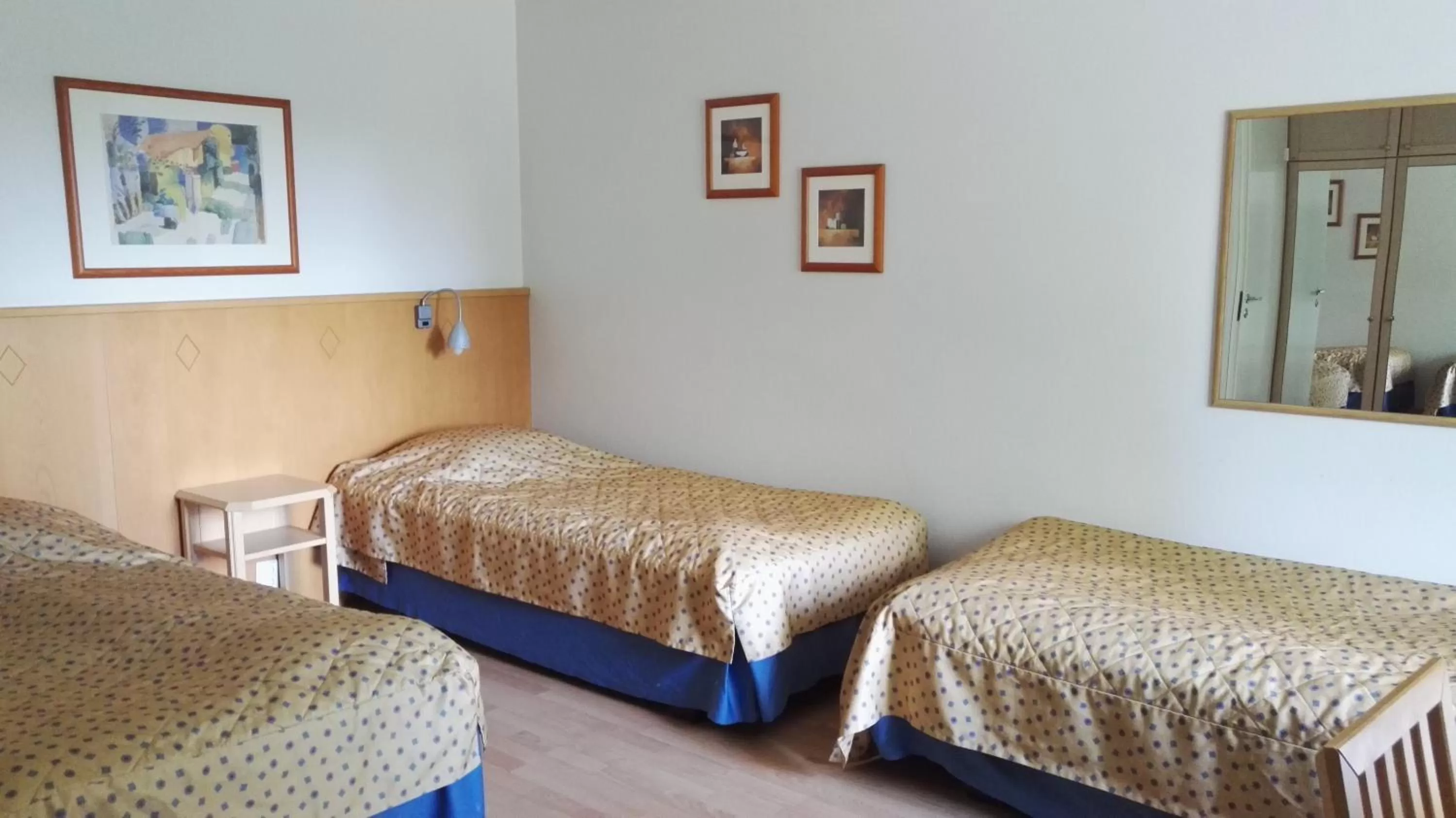 Bed in Revontuli Resort Rooms