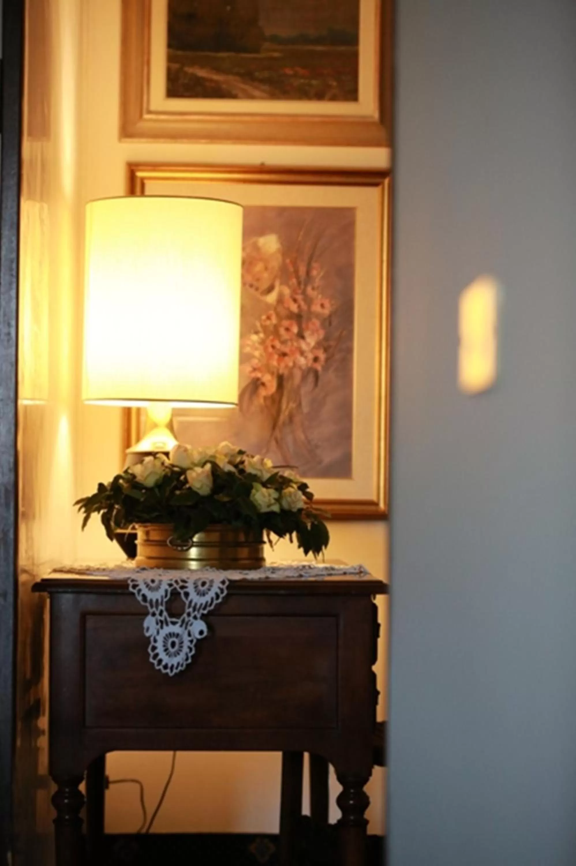 Communal lounge/ TV room in Hotel Al Posta