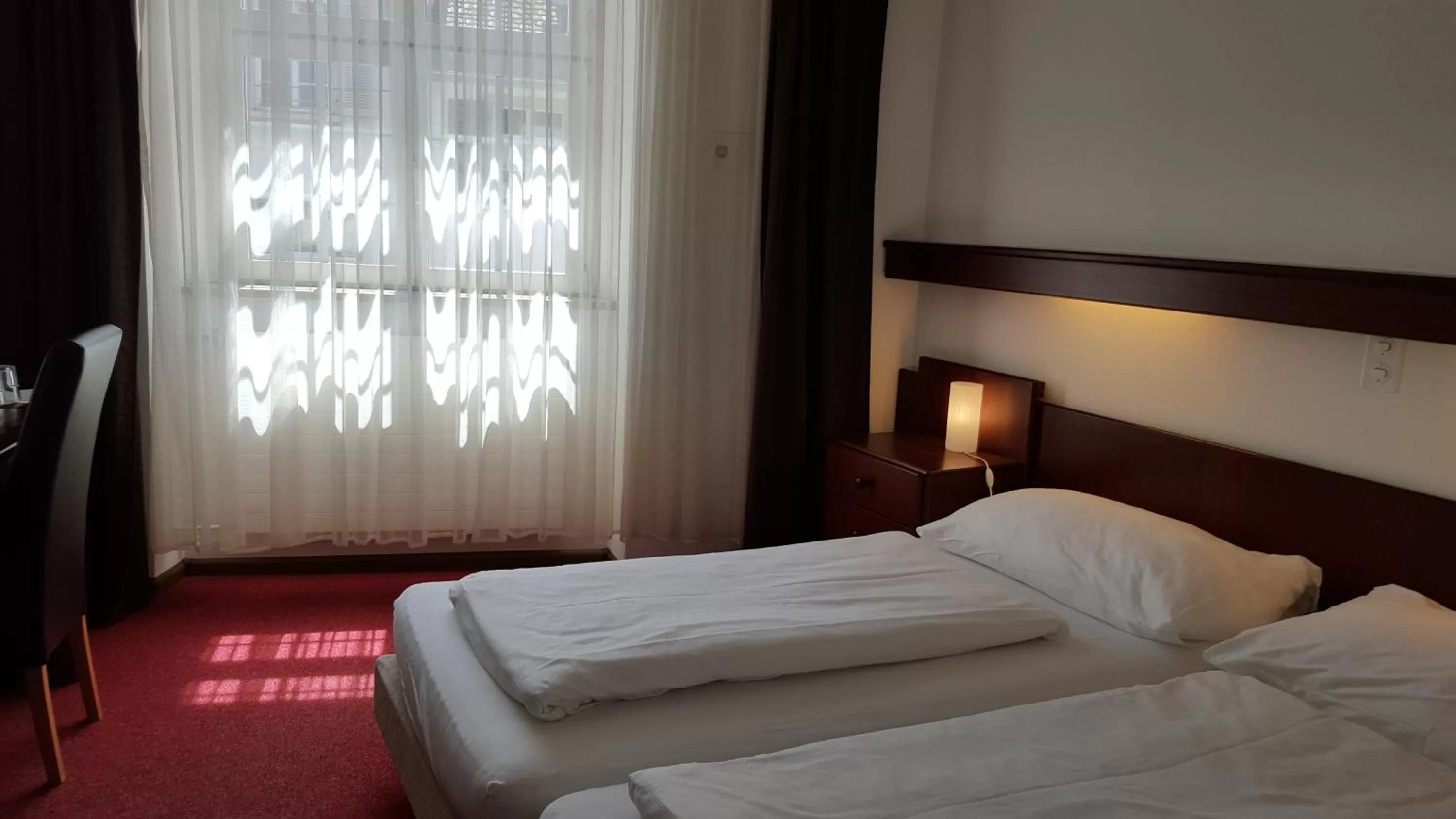 Bed in Spalenbrunnen Hotel & Restaurant Basel City Center