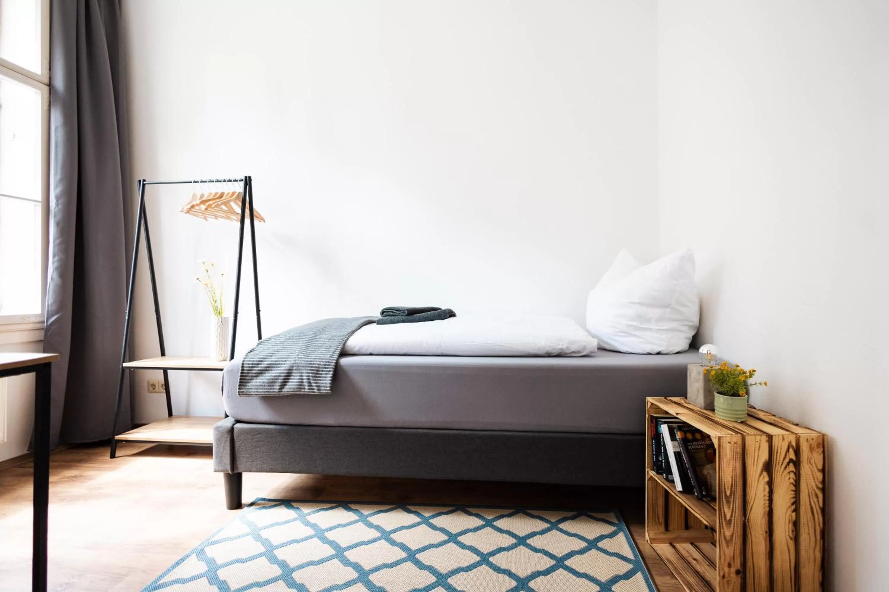 Bed in Ko-Living Space an der Oper - Street Art Design Apartments