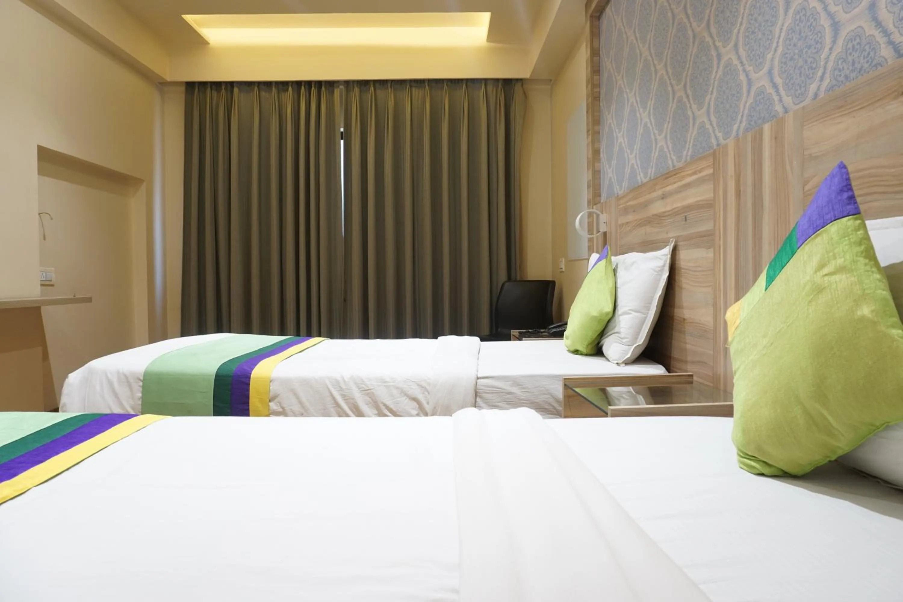 Bedroom, Bed in Treebo Classic Grande, Camp