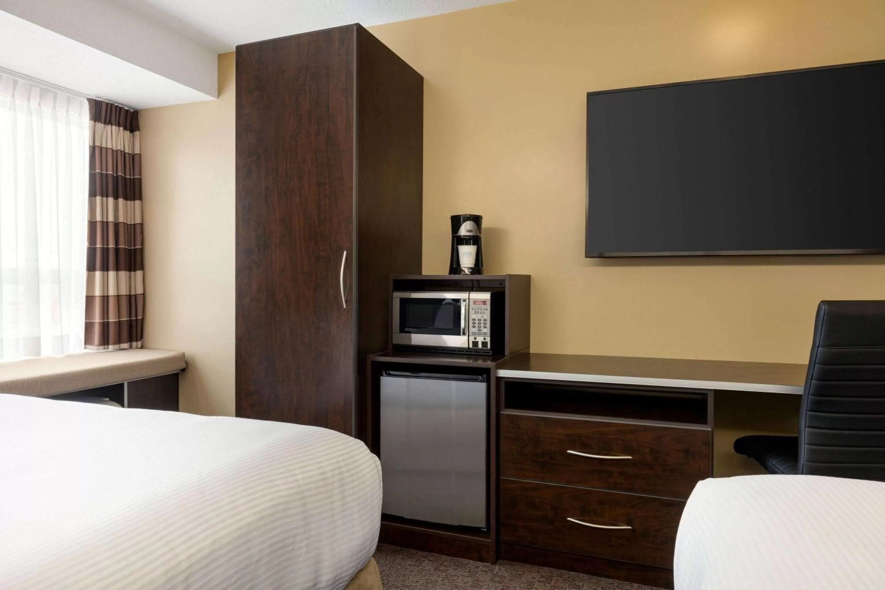 Photo of the whole room, Bed in Microtel Inn & Suites by Wyndham Estevan