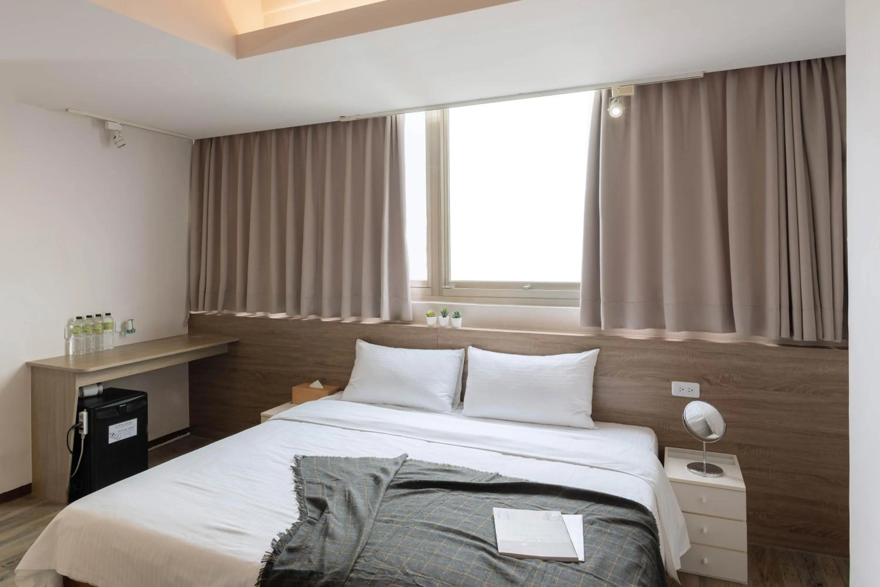 Bed in Uno Backpackers Inn