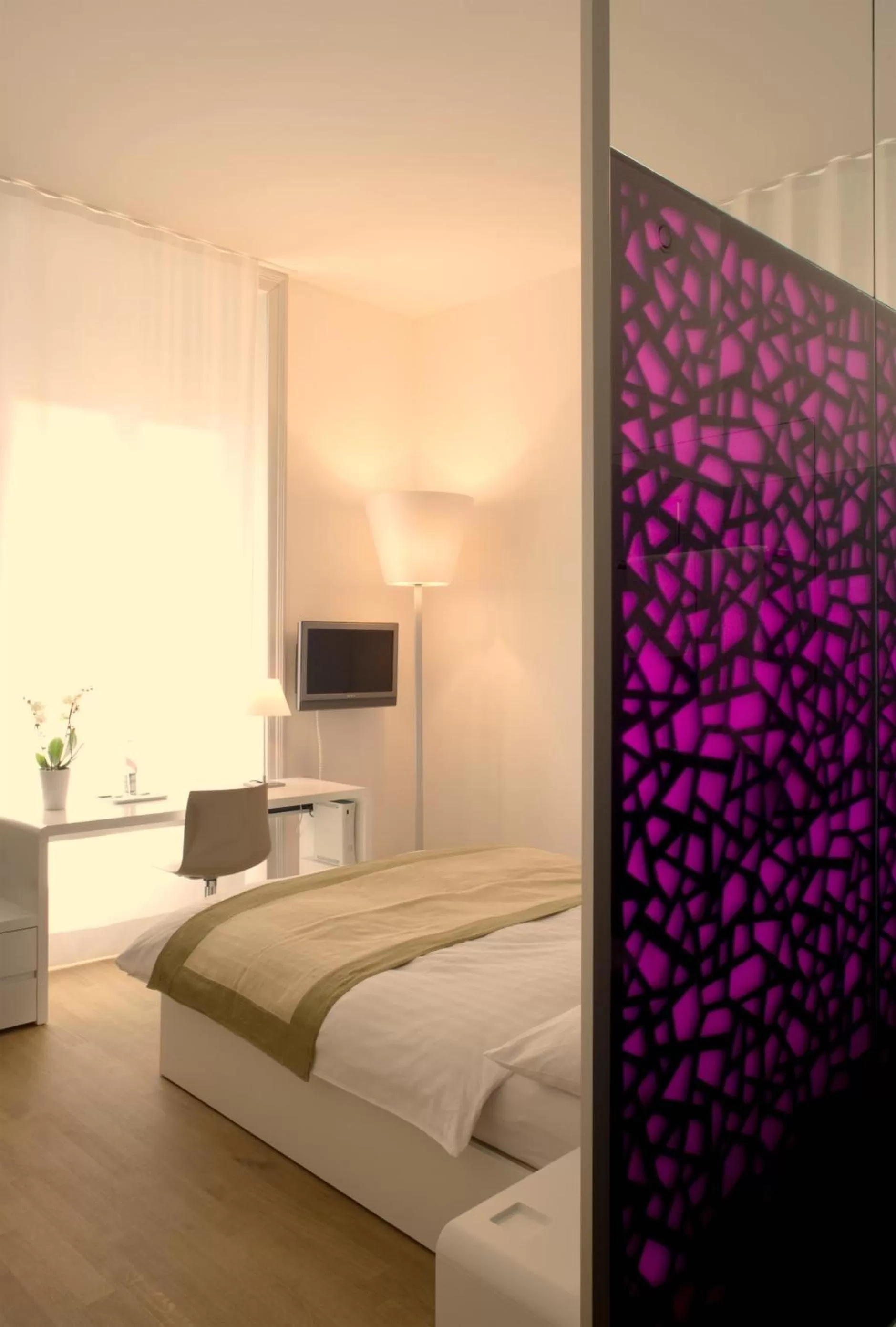 Bed in Design Hotel Plattenhof