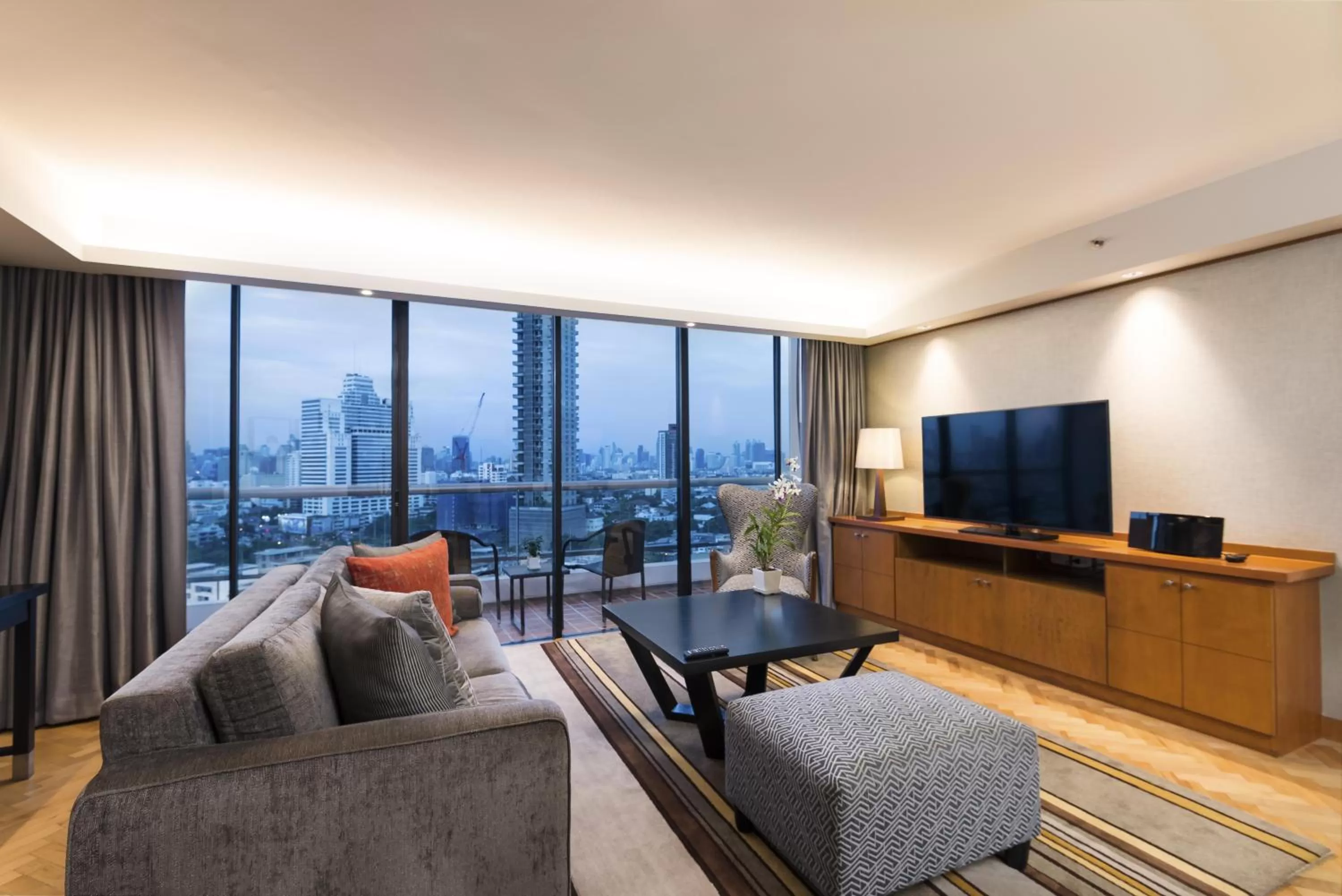Communal lounge/ TV room in Chatrium Sathon Bangkok