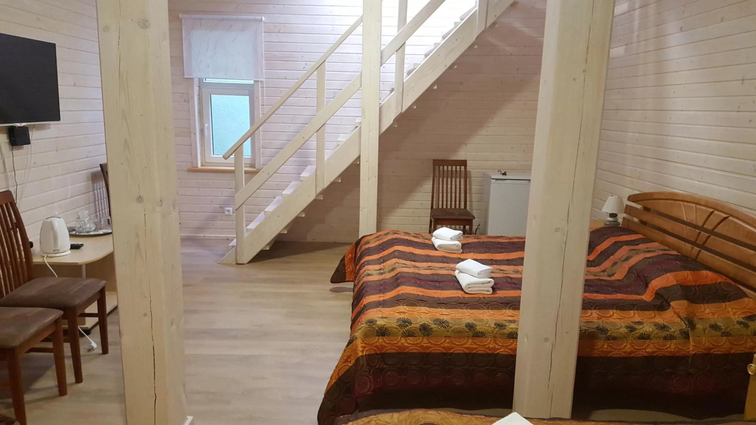 Photo of the whole room in Sunset Hotel