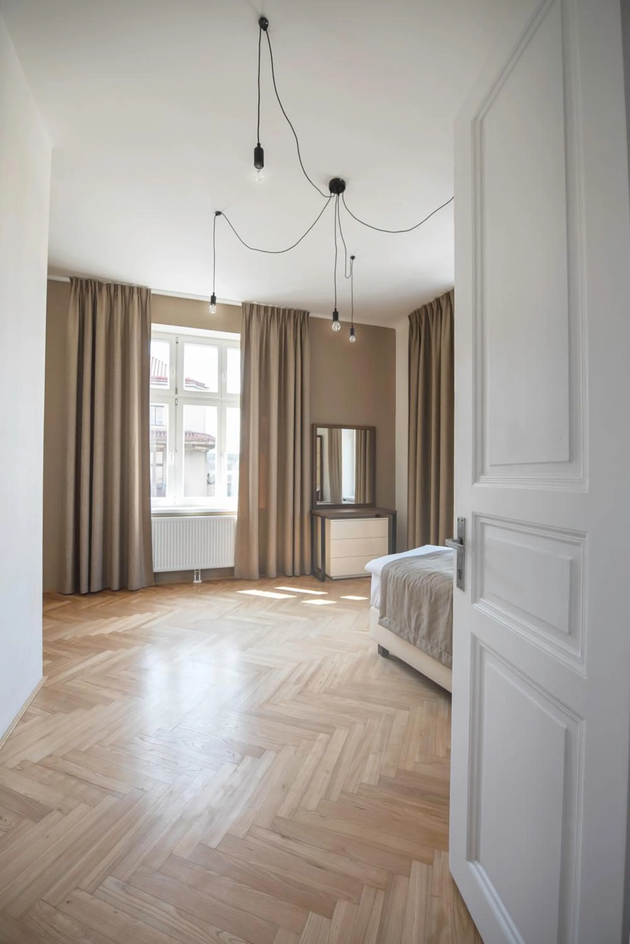 Bed in Letna Garden Suites