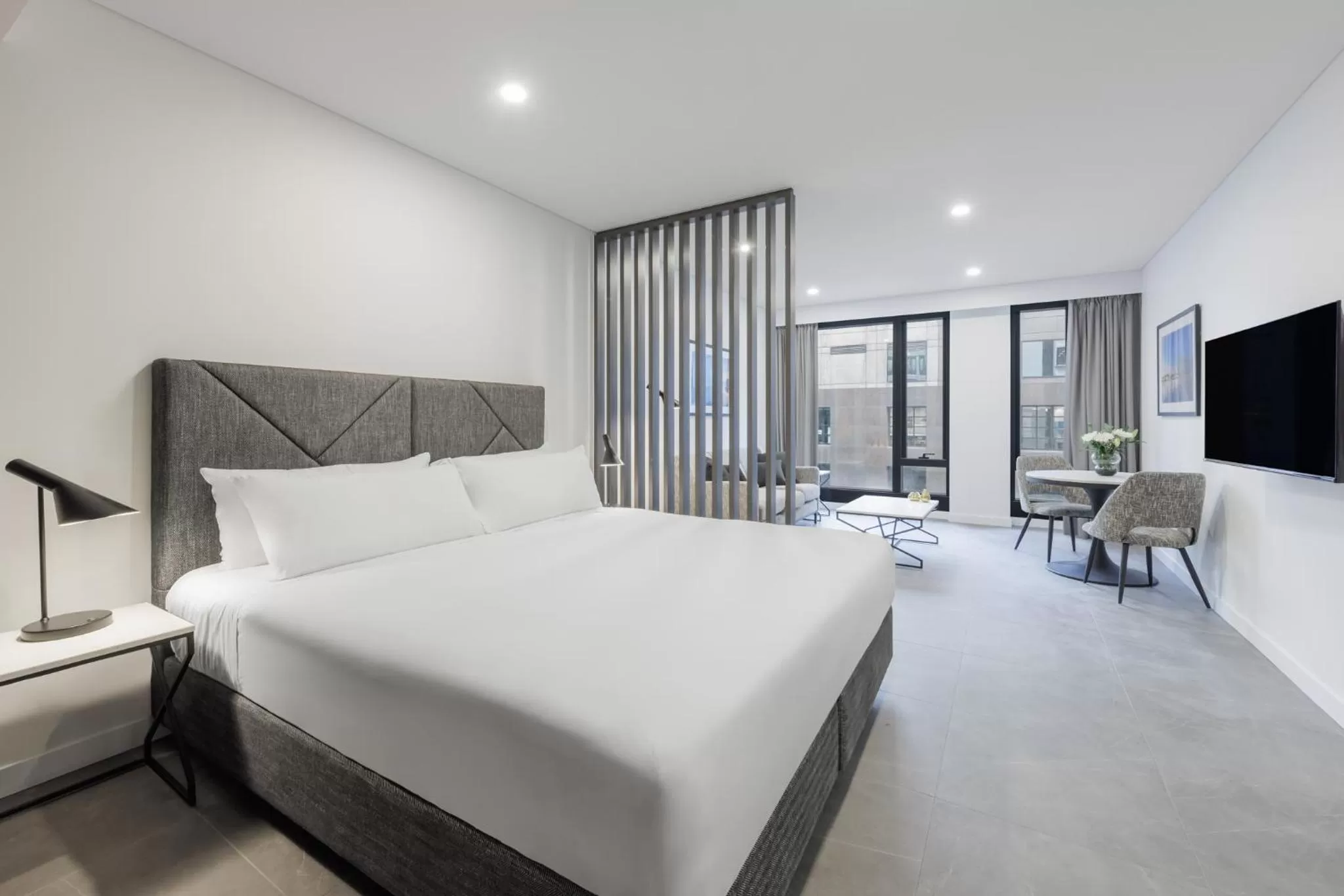 Bed in Meriton Suites Melbourne