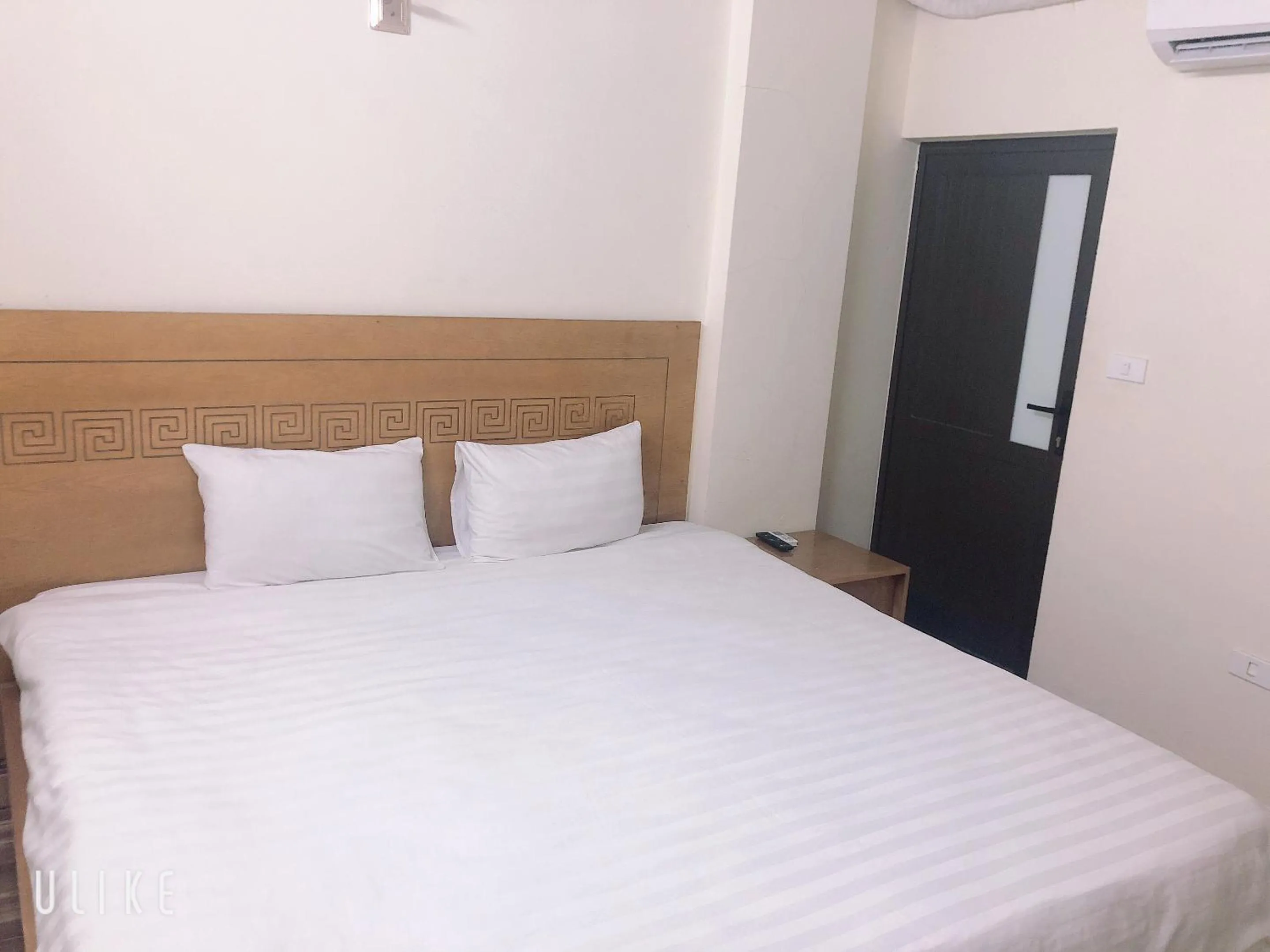 Bed in Old Town Palace Guest House