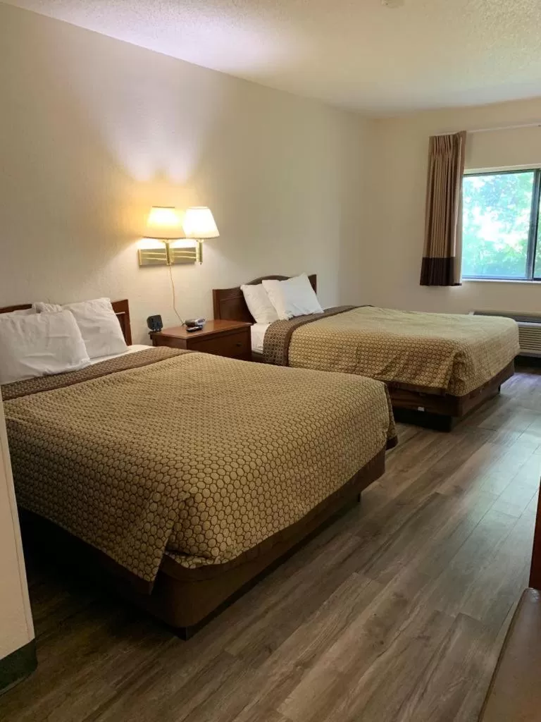 Bed in Days Inn by Wyndham Topeka