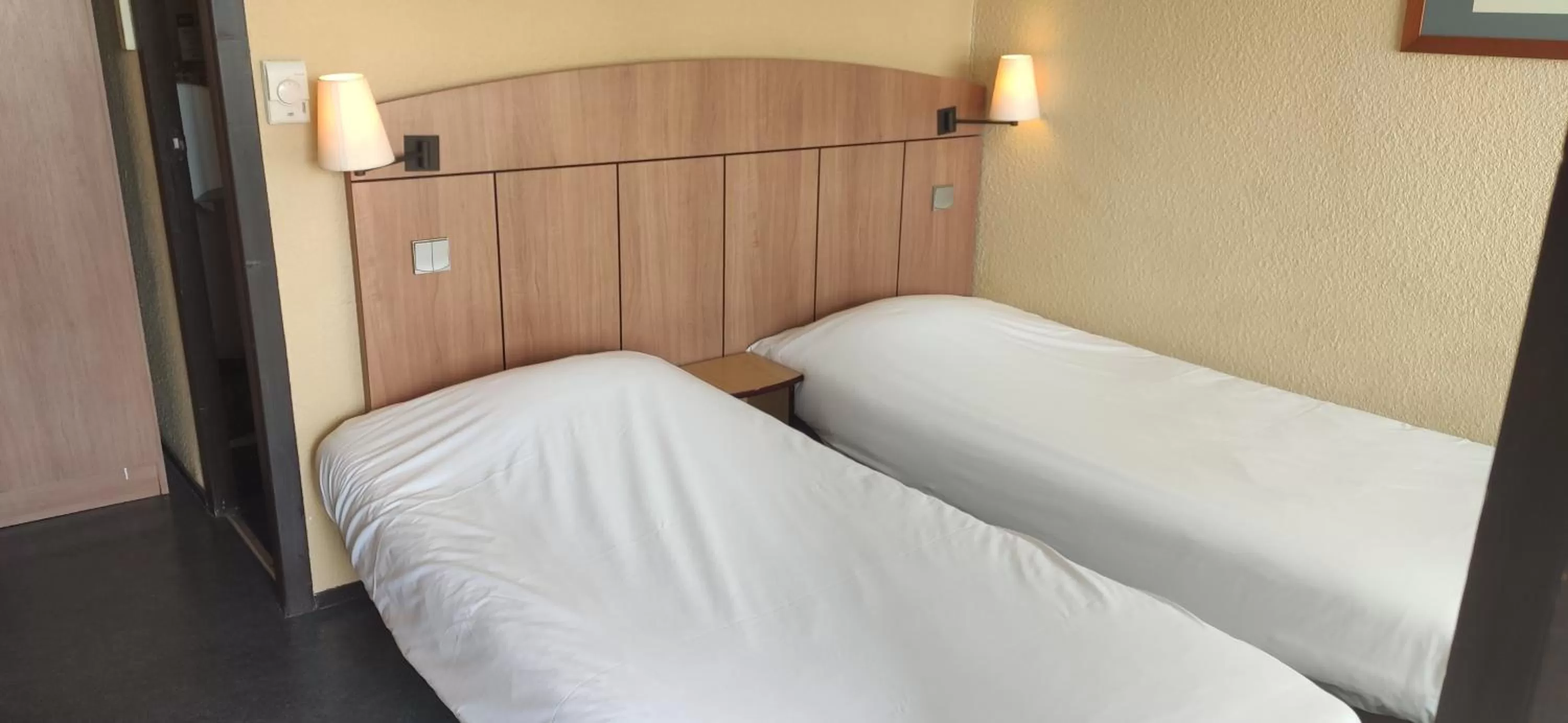 Photo of the whole room, Bed in Kyriad Tarbes Odos