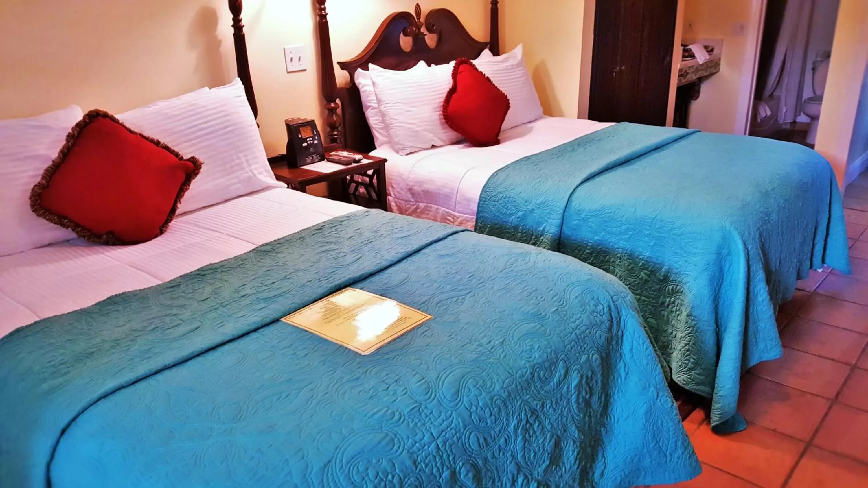 Deluxe Double Room with Two Double Beds in The Caribbean Court Boutique Hotel Deluxe Double Room with Two Double Beds in The Caribbean Court Boutique Hotel