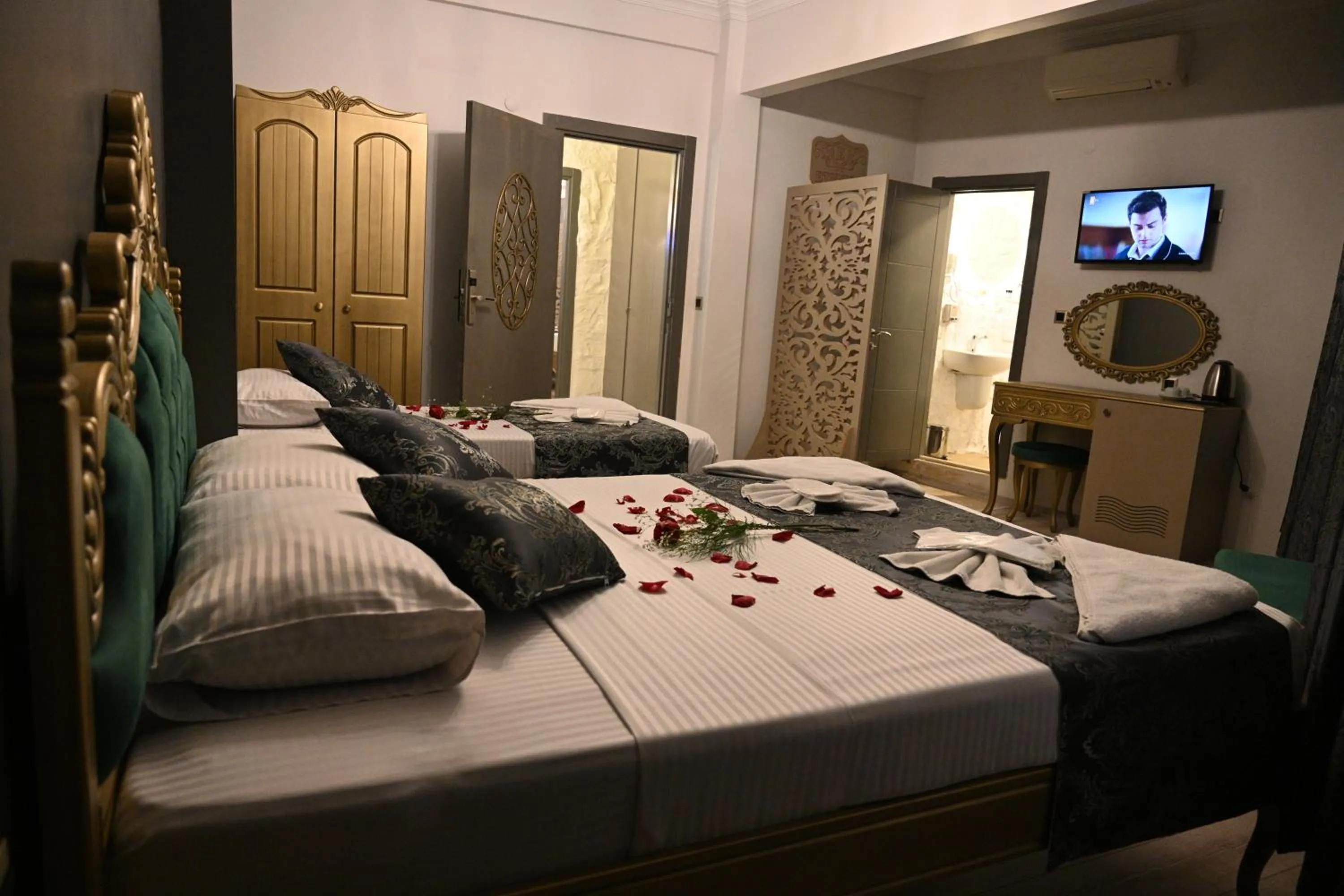Bed in Ethnica Suites