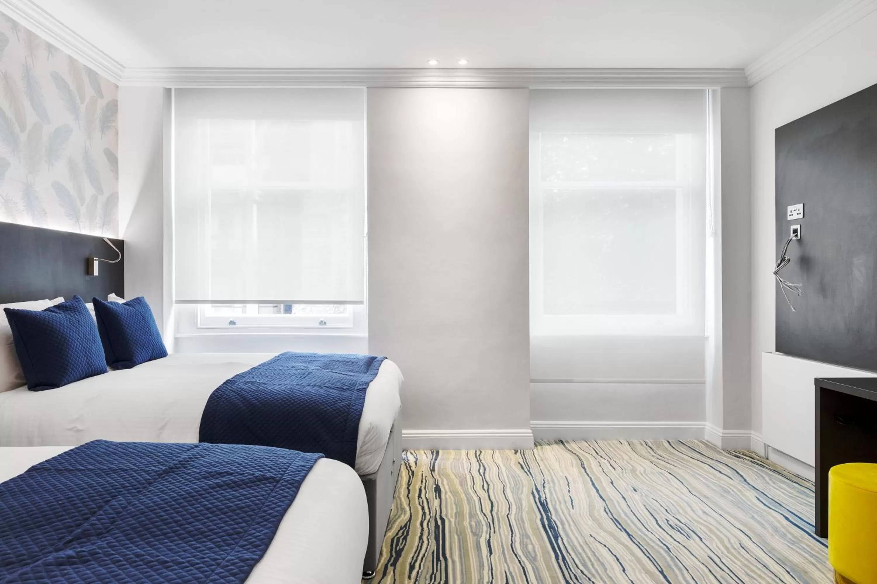 Bed in Commodore Hotel