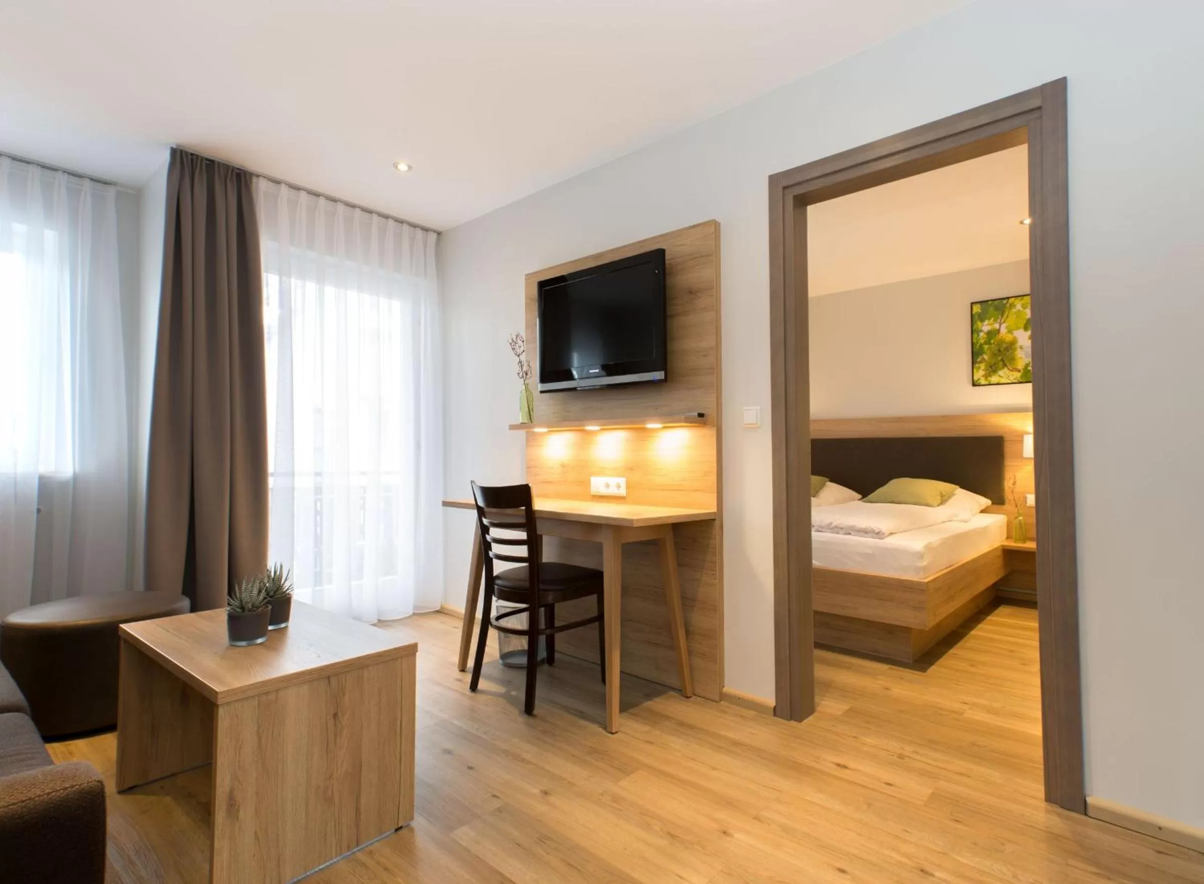 TV/Entertainment Center in Restaurant & Appartements In Vino Veritas