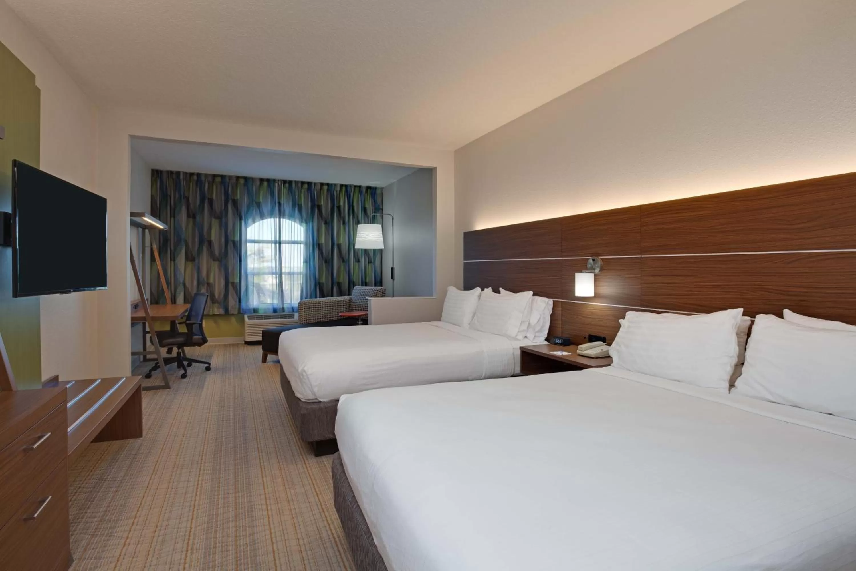 Bed in Holiday Inn Express & Suites Orlando International Airport by IHG
