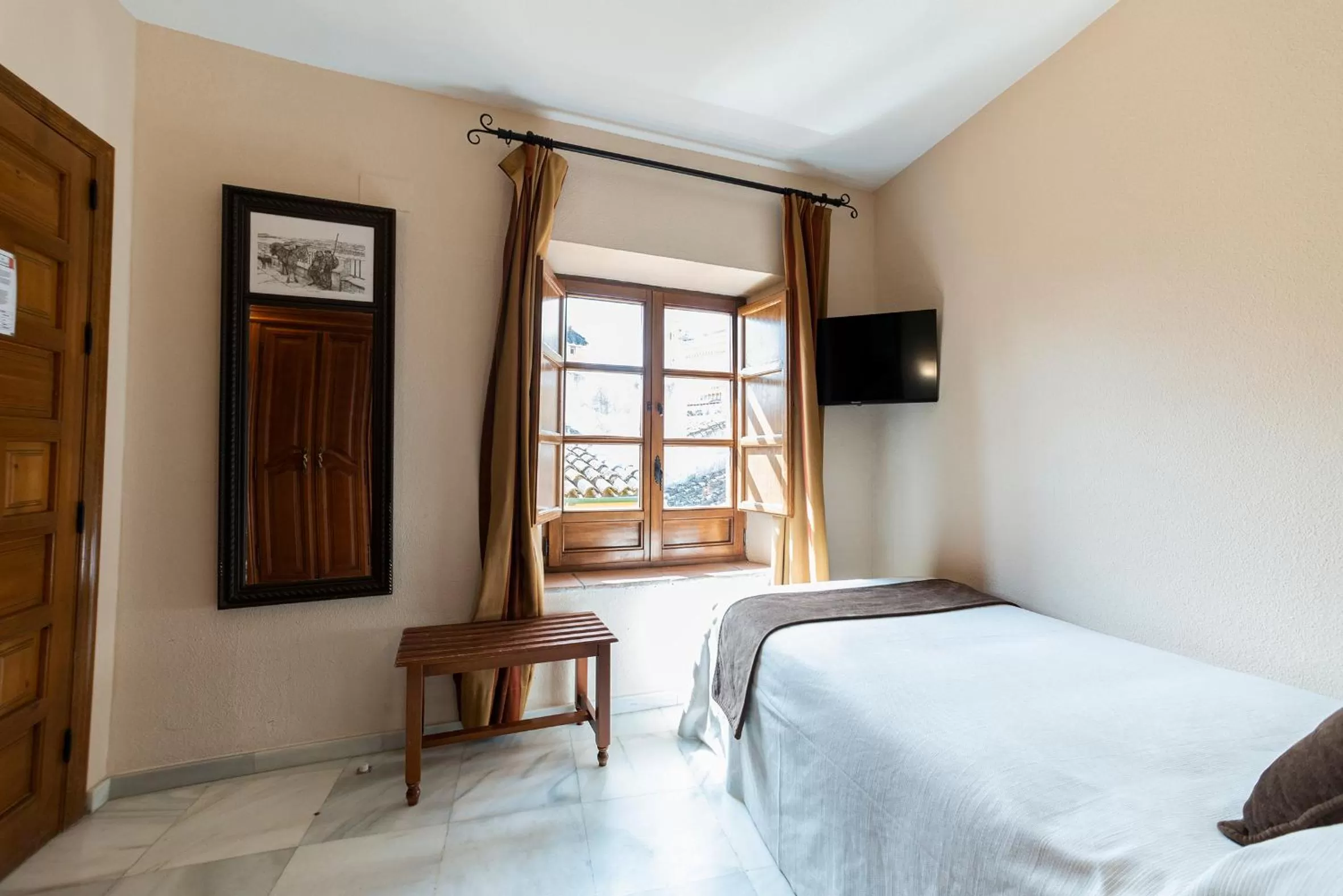 Photo of the whole room, Bed in Hotel Casa Museo de la Mezquita