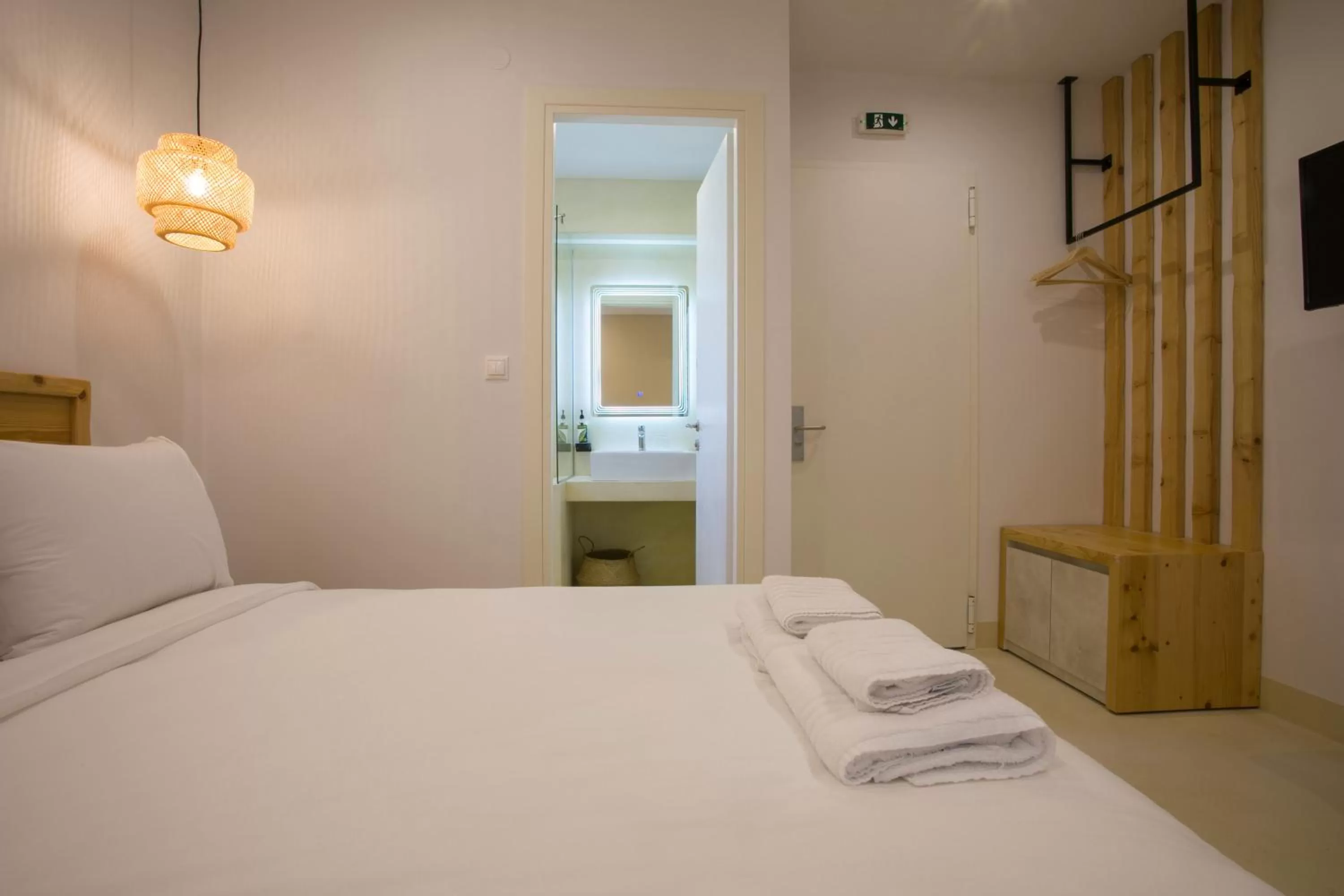 Toilet, Bed in White Corner