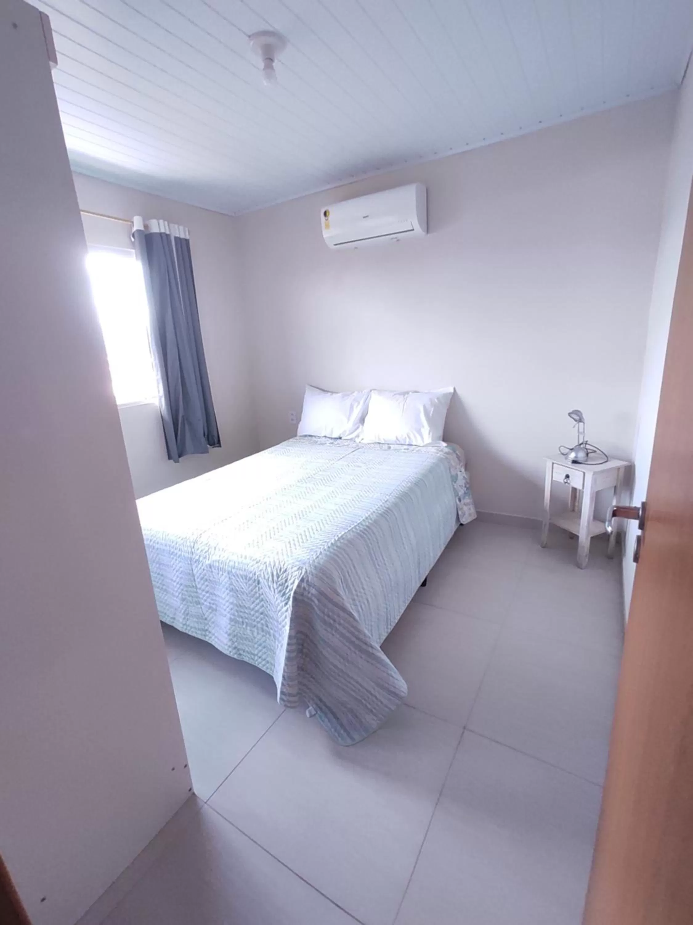 Bed in Pousada Massiambu