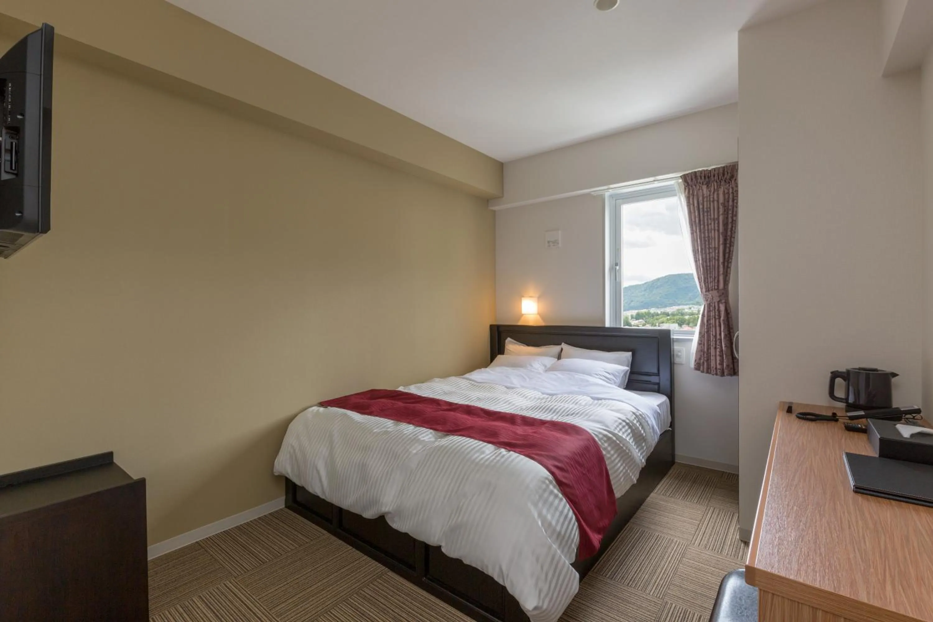 Bed in Morinoyu Resort