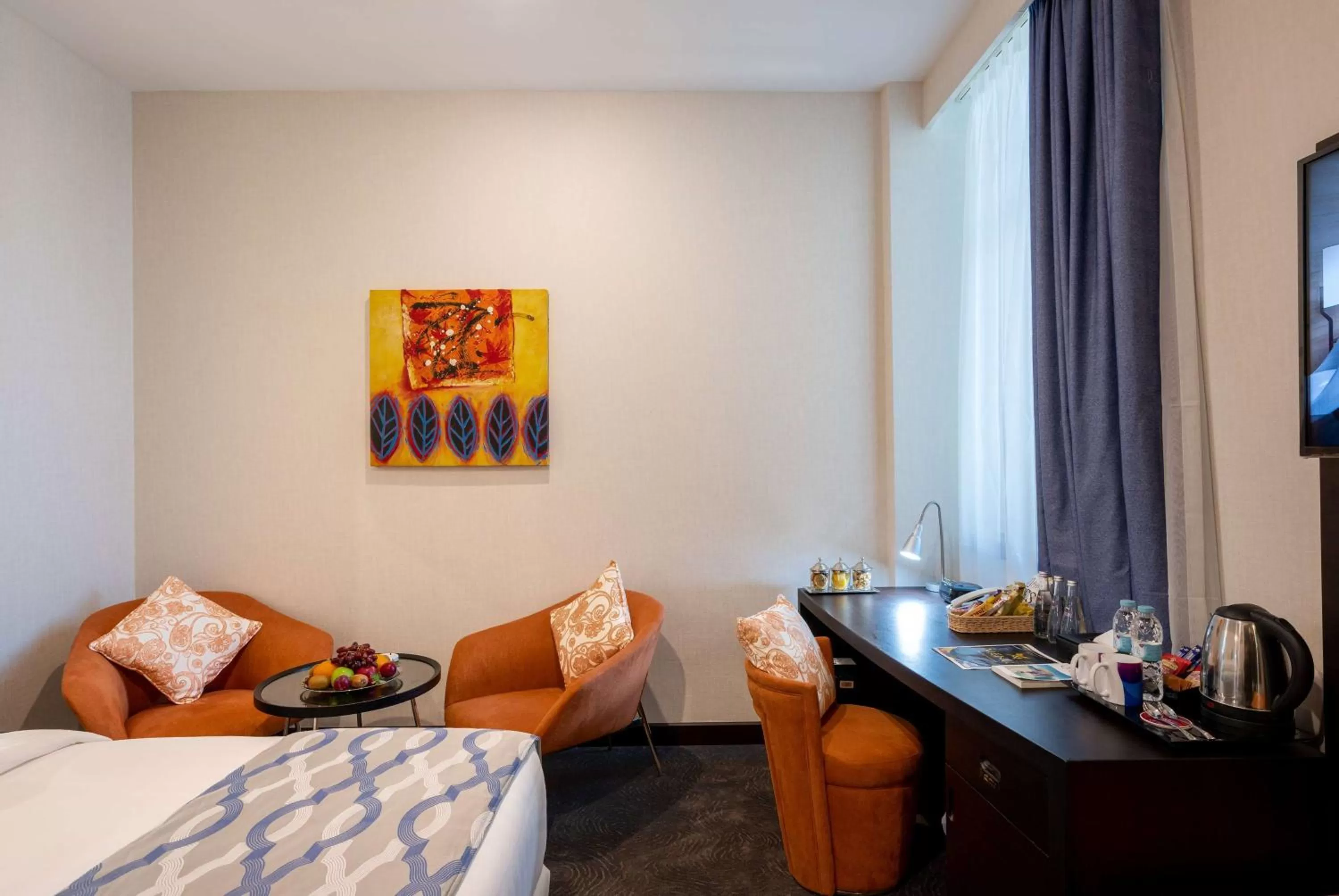 Photo of the whole room, Bed in Ramada Encore Doha by Wyndham