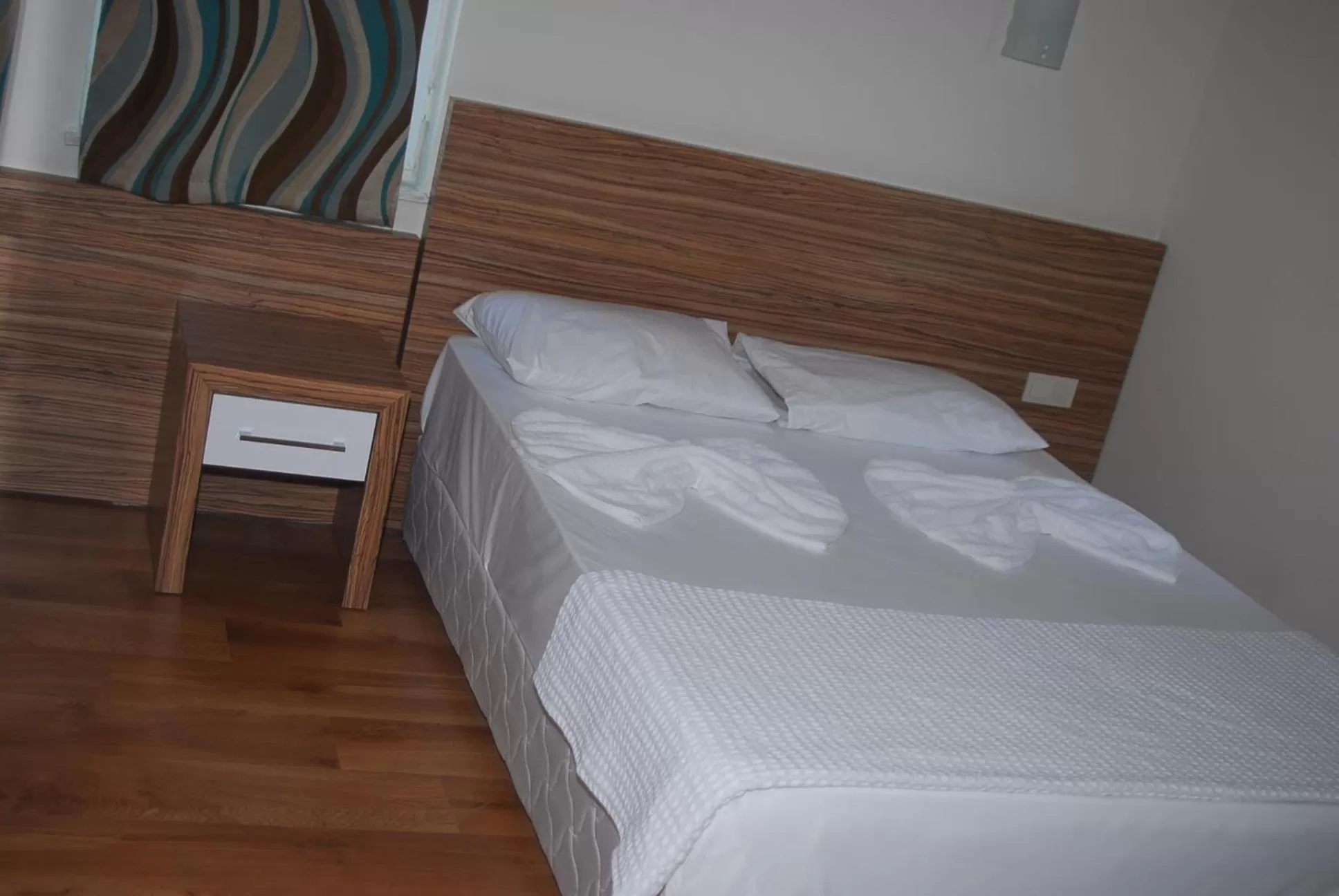 Bed in Yucesan Hotel