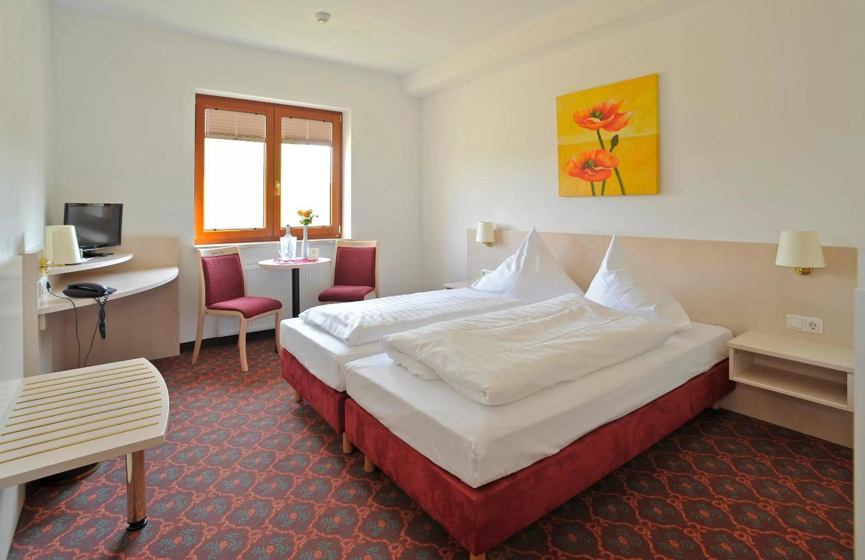 Photo of the whole room, Bed in Hotel Quickborn & Gästehaus Hesse