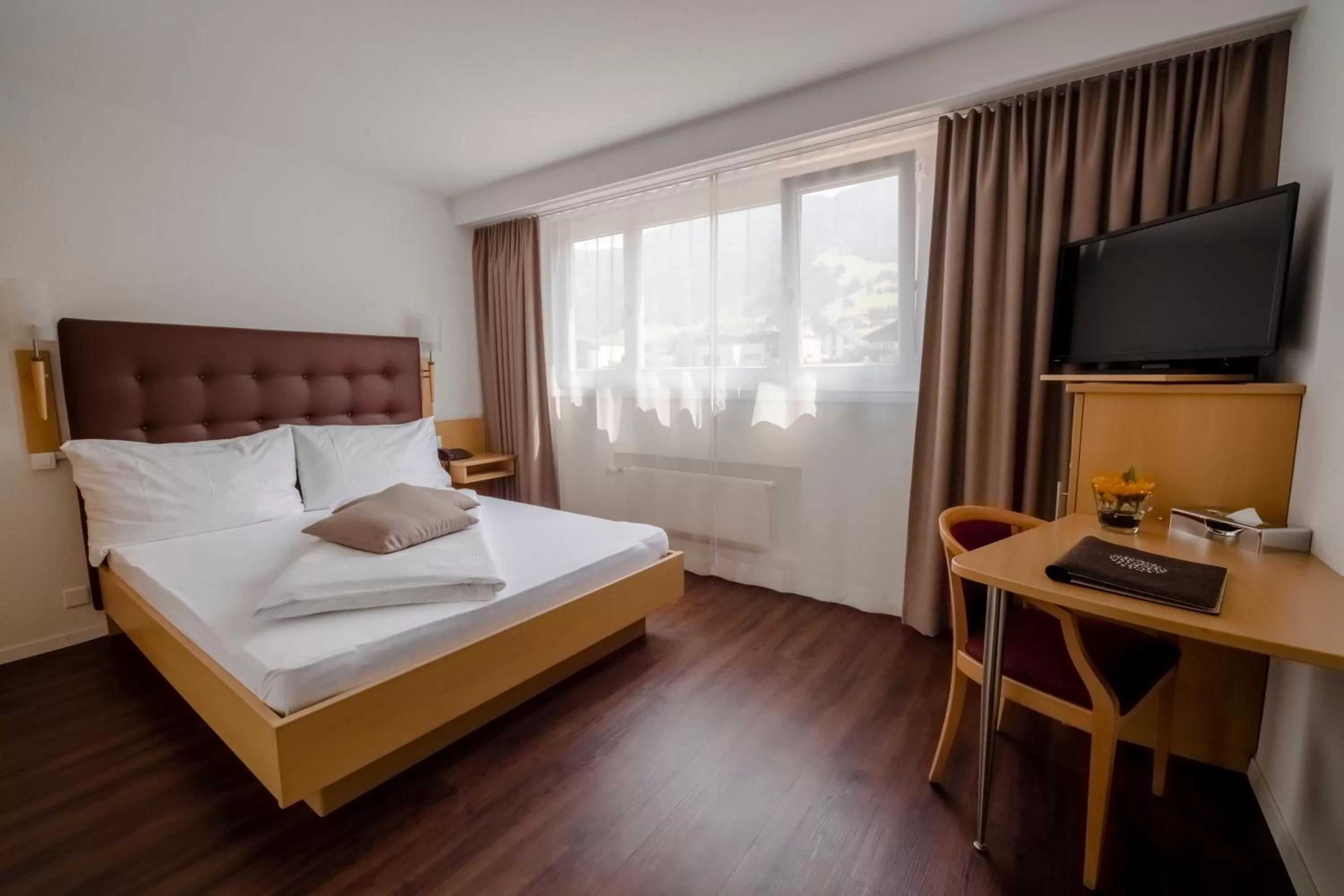 Photo of the whole room, Bed in Seerausch Swiss Quality Hotel