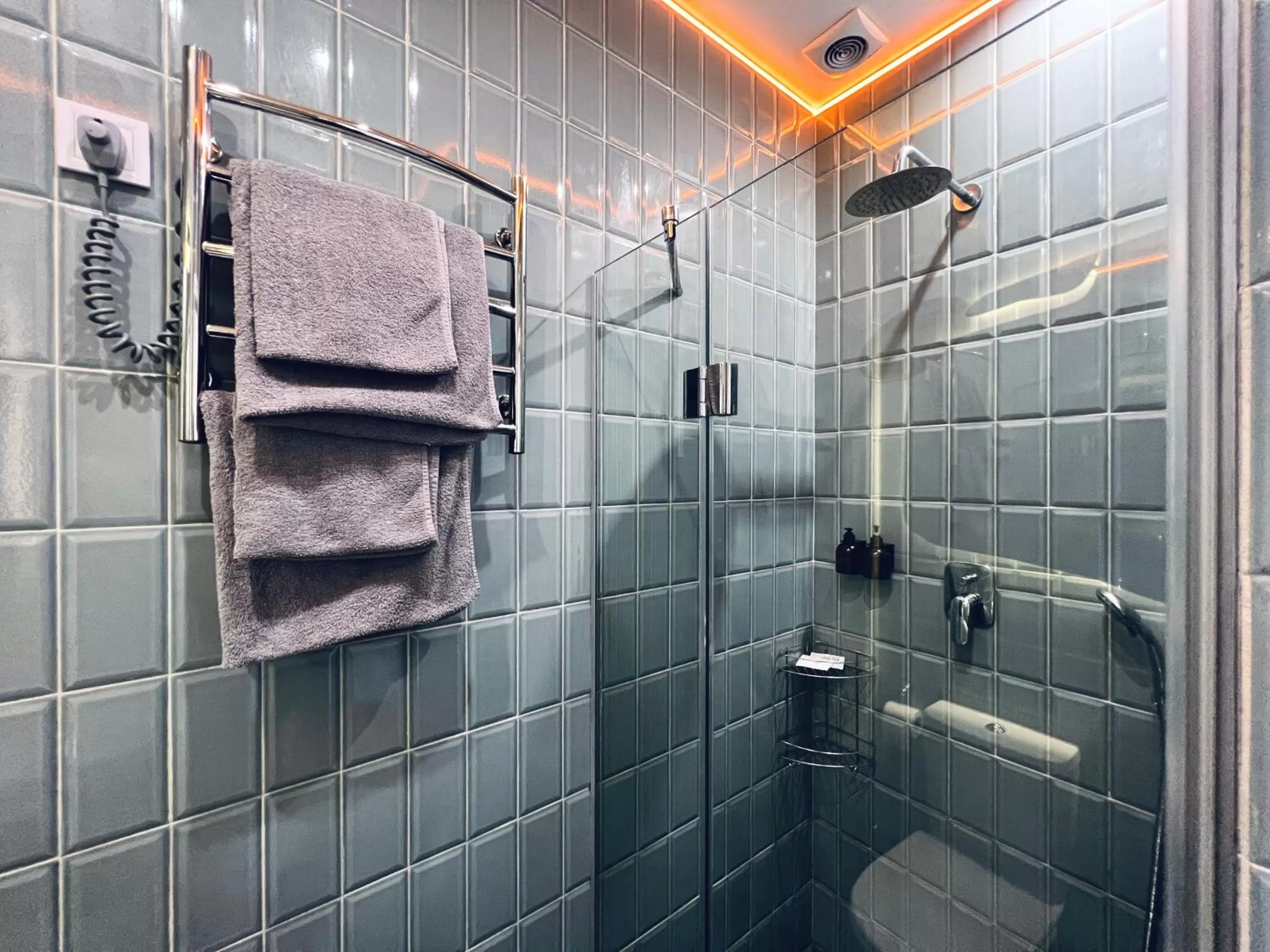 Shower, Bathroom in Kyiv Panorama Apartments near Gulliver