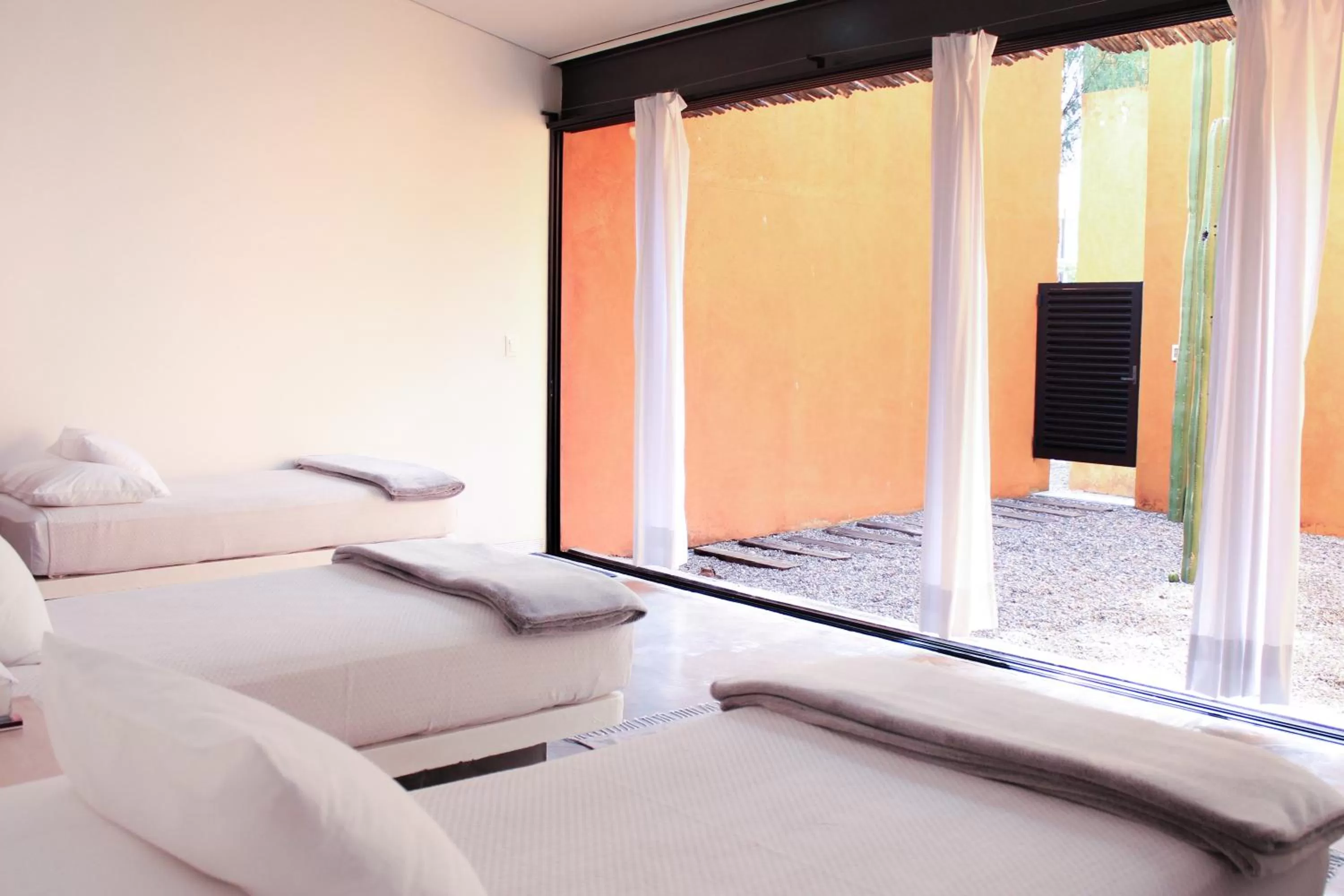 Bed in Hotel Cosijo - San Jeronimo Tlacochahuaya