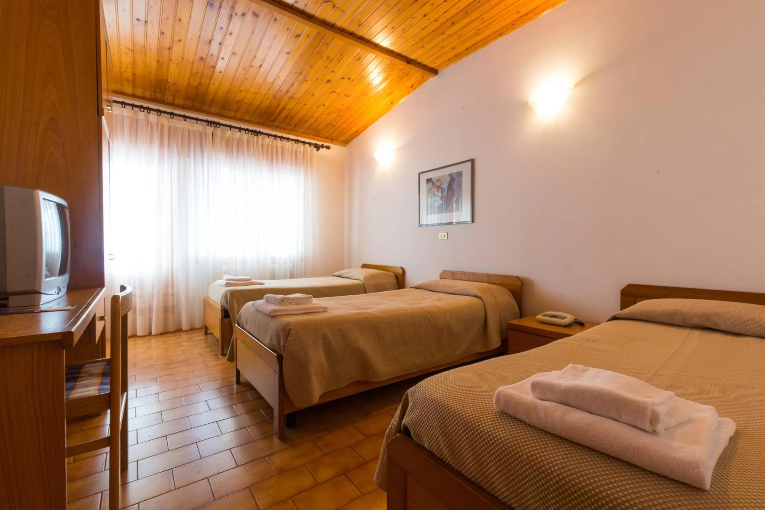 Bed in Albergo Dalla Mena