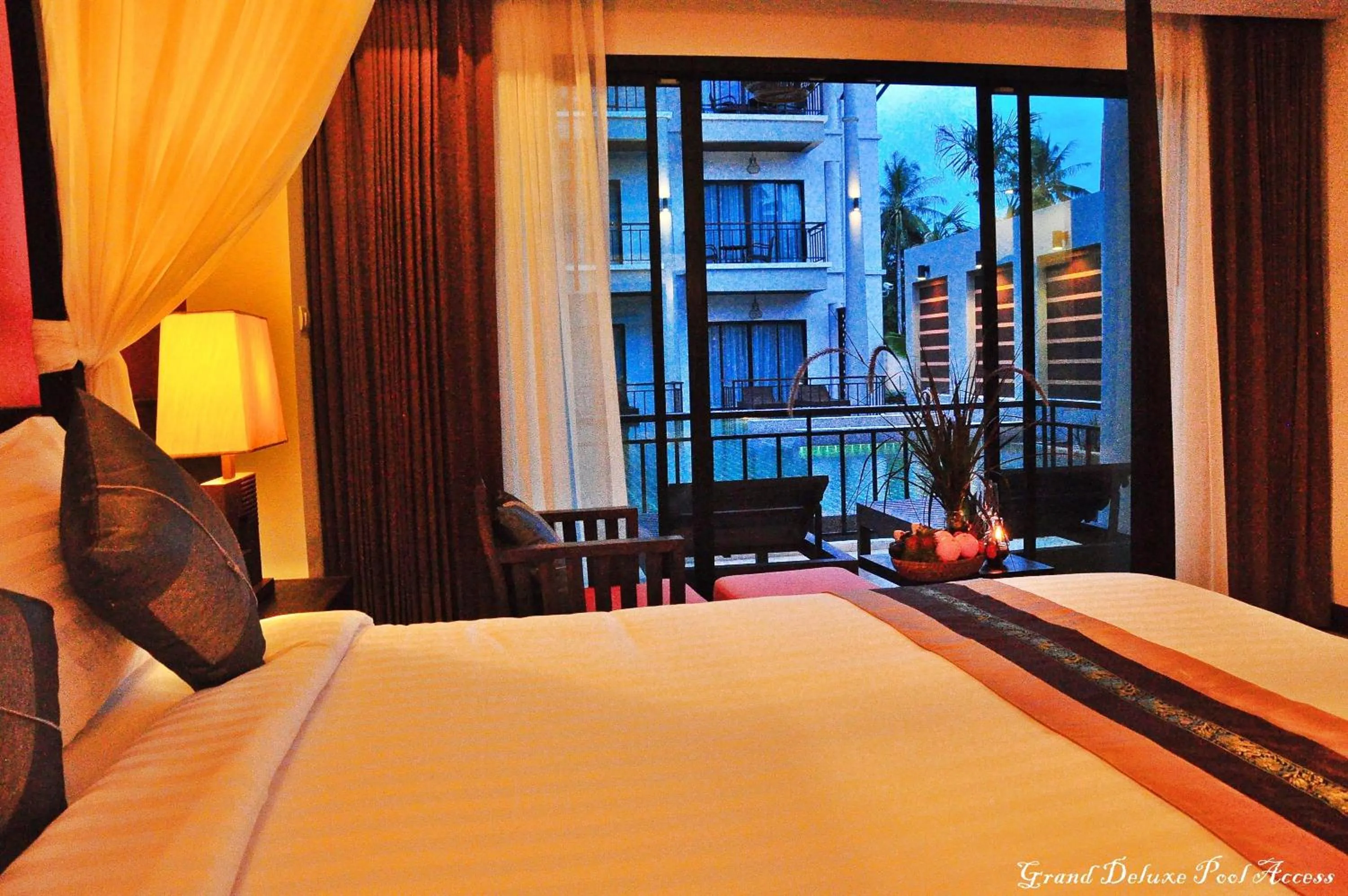 Bed in Navatara Phuket Resort
