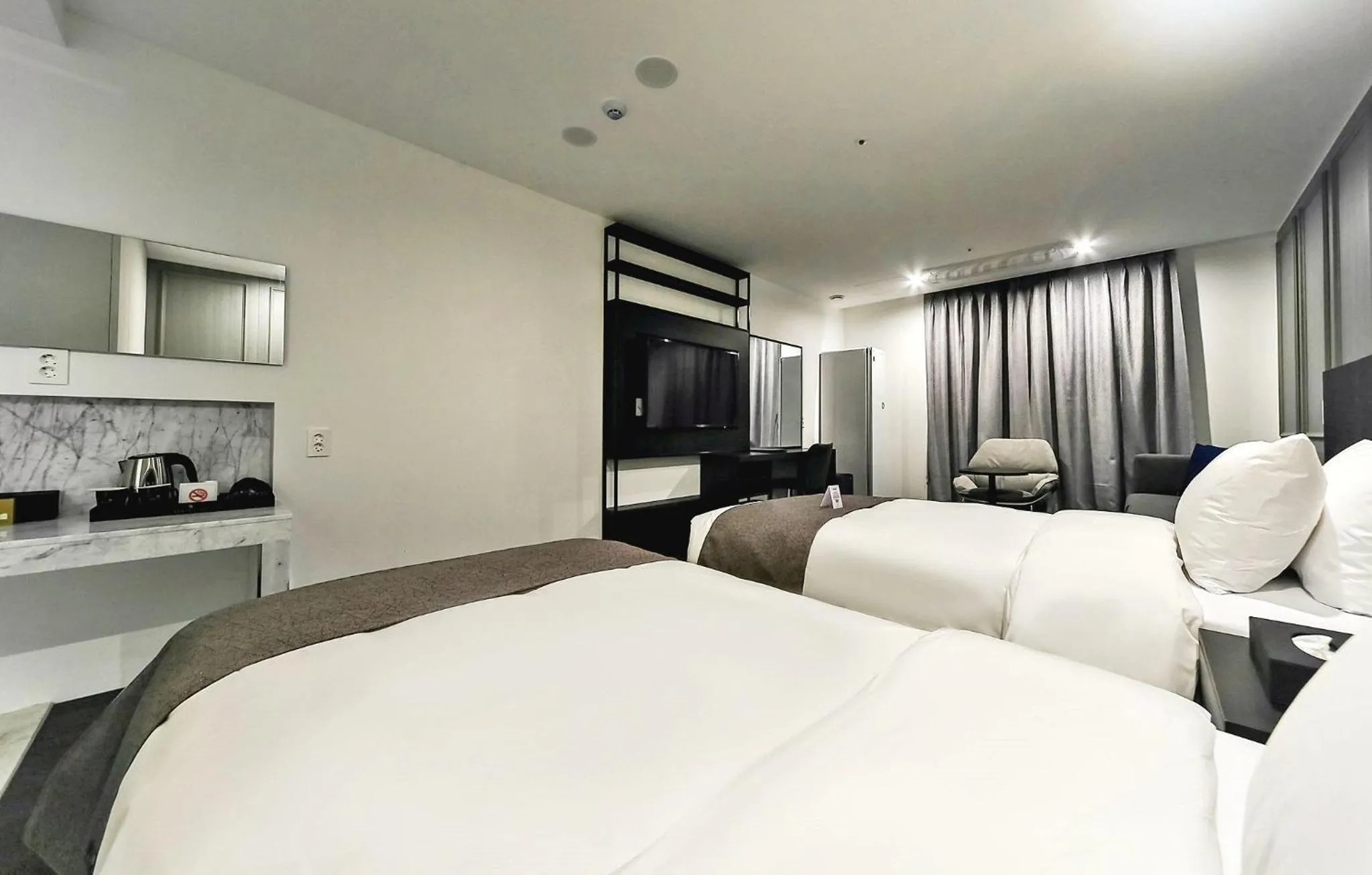 Bed in Hotel Noblestay