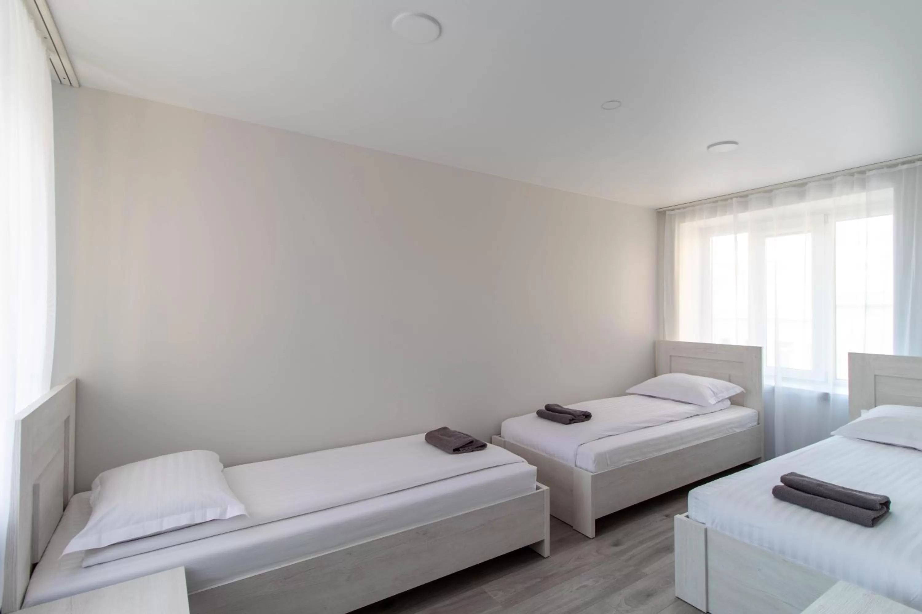 Bed in Dzukija Hotel