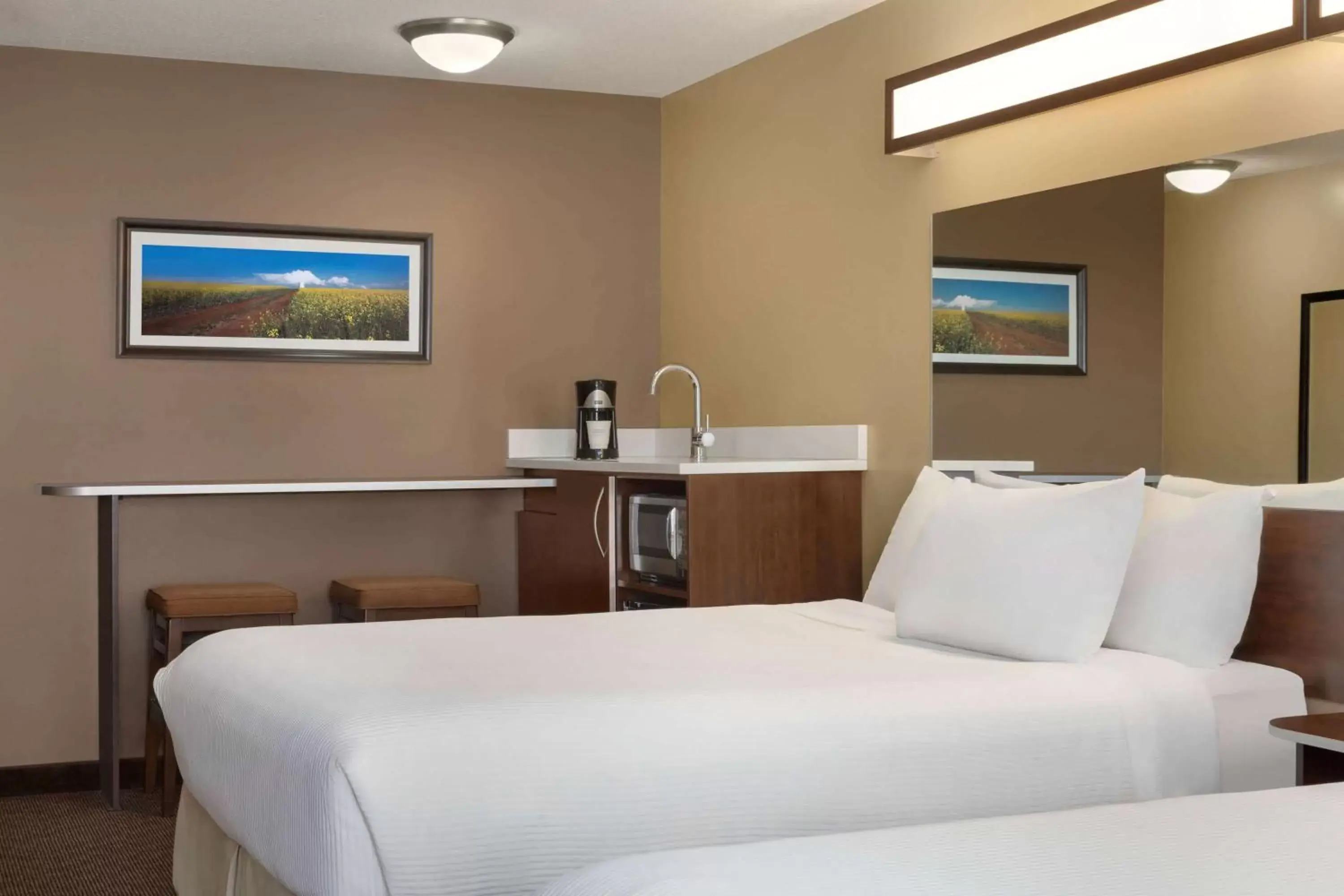 Business Queen Room with Two Queen Beds - Non-Smoking in Microtel Inn & Suites by Wyndham Estevan Business Queen Room with Two Queen Beds - Non-Smoking in Microtel Inn & Suites by Wyndham Estevan