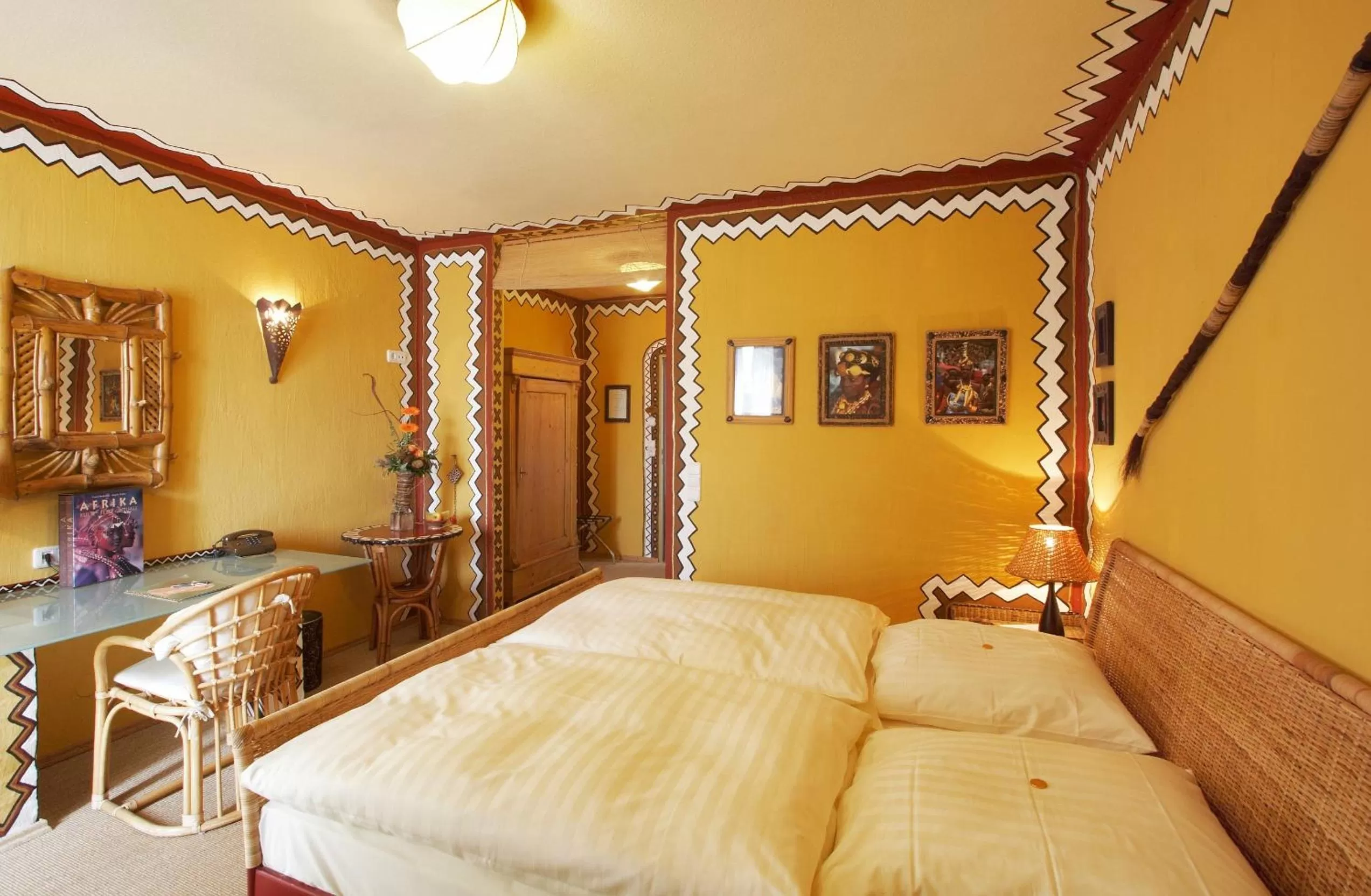 Photo of the whole room, Bed in Hotel Goldflair am Rathaus