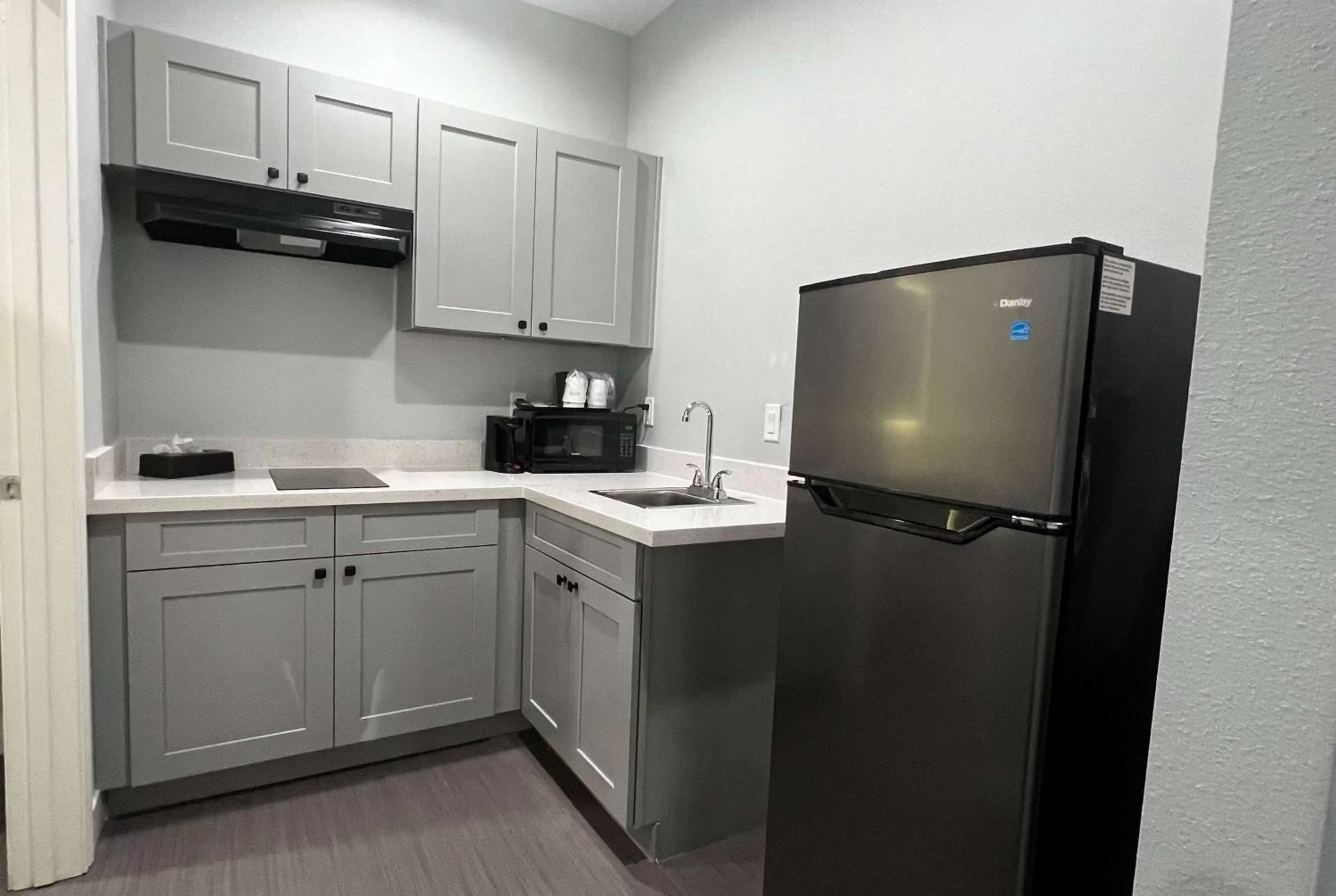 Kitchen or kitchenette in Baymont by Wyndham Freeport Texas