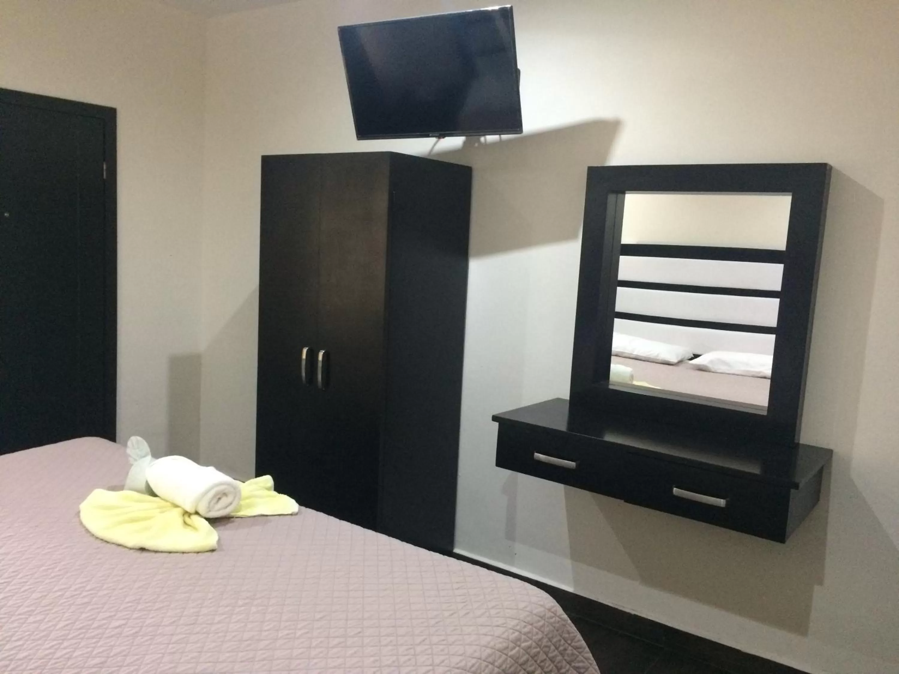 Decorative detail, TV/Entertainment Center in Hotel Sevilla Palenque