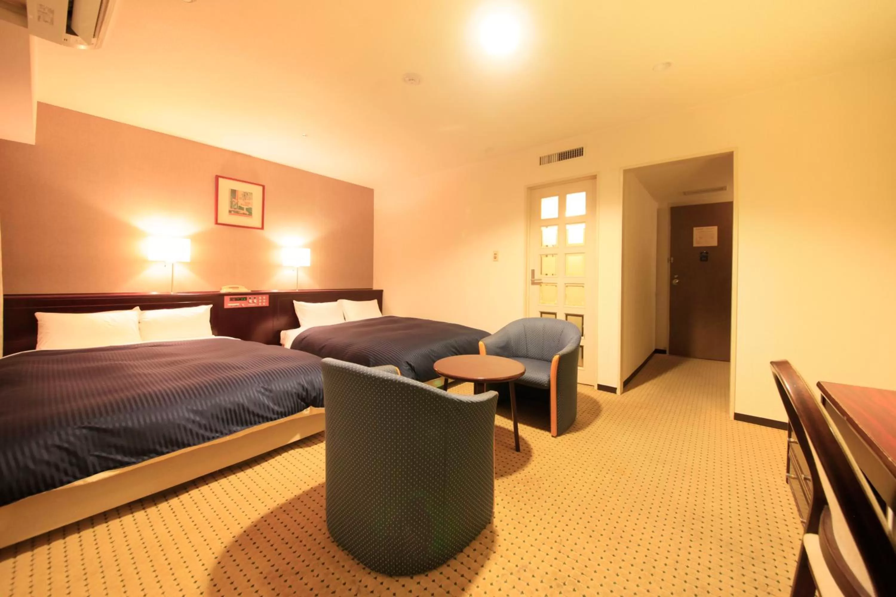 Photo of the whole room, Bed in Quintessa Hotel Ogaki