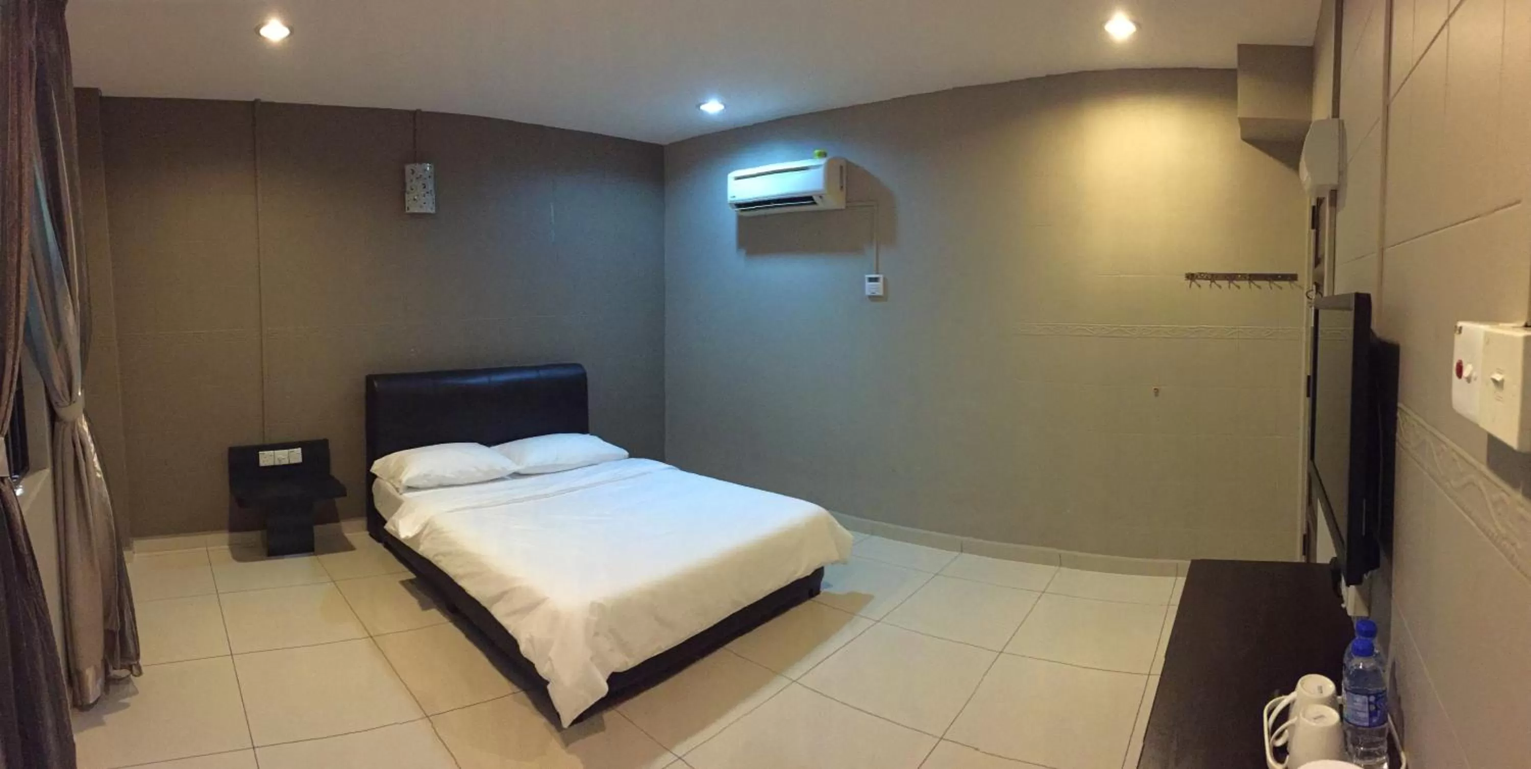 Photo of the whole room, Bed in Homestay Muar