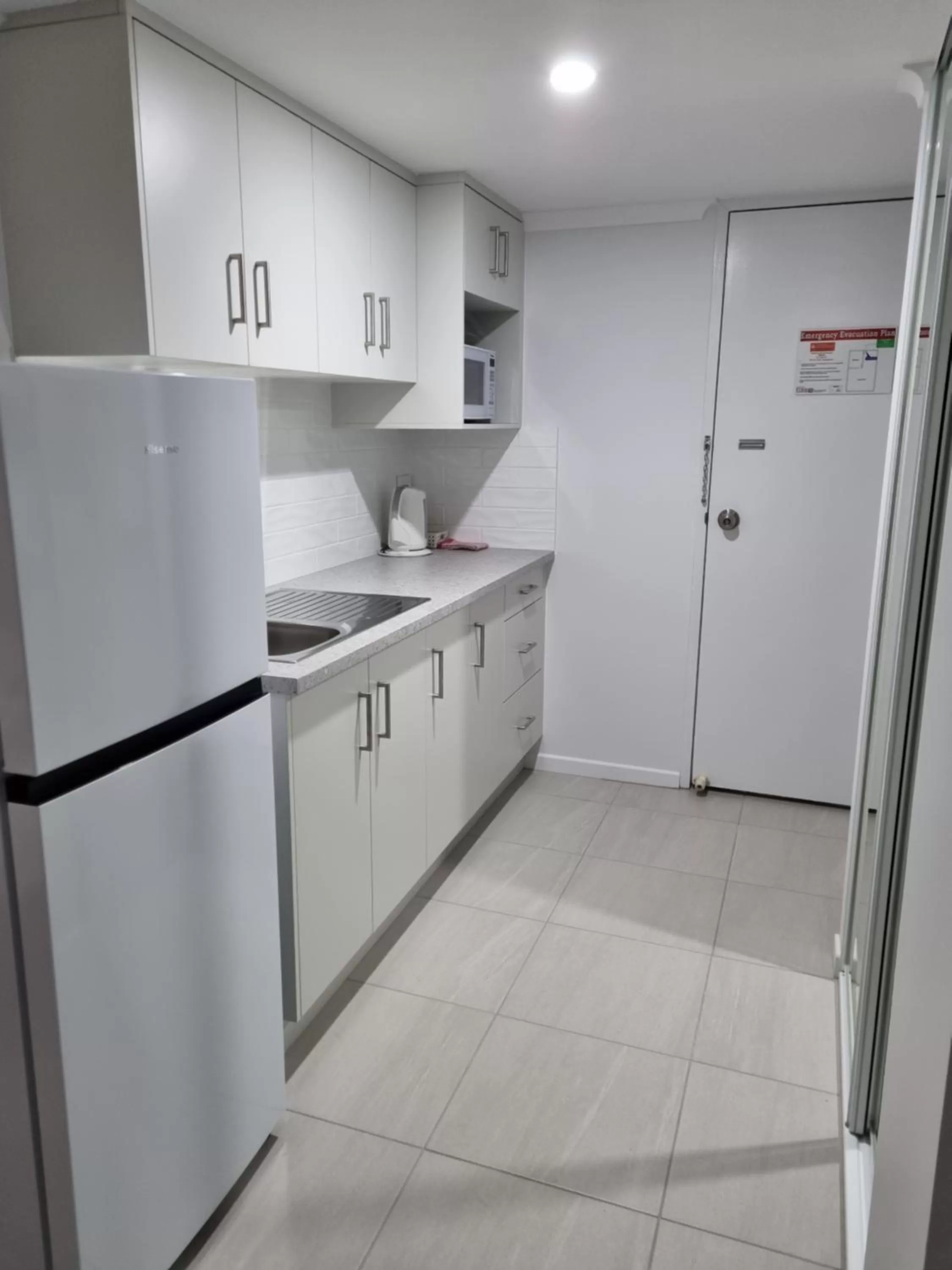 Kitchen or kitchenette in Rockhampton Serviced Apartments