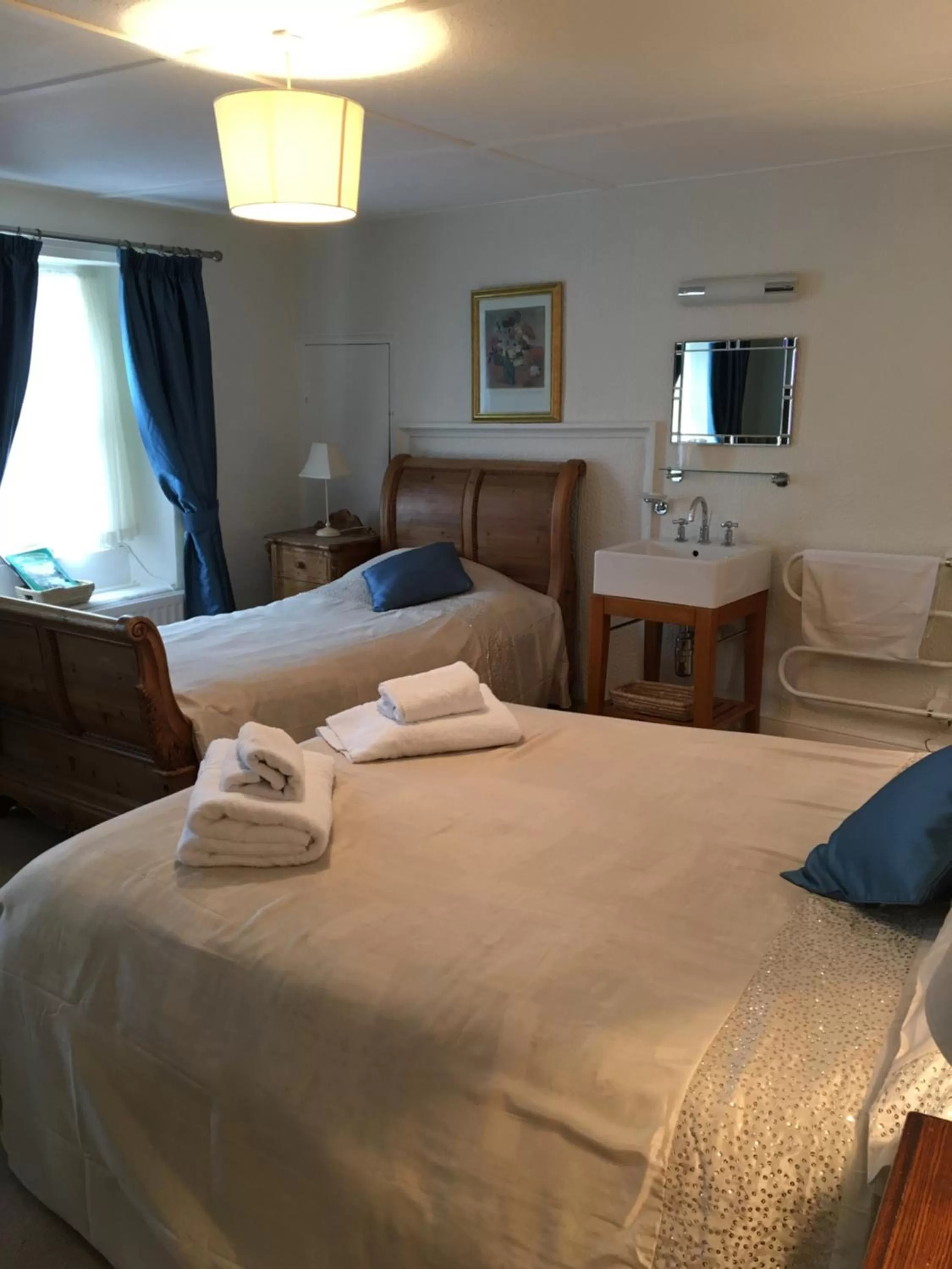 Bed in The Old Well Inn