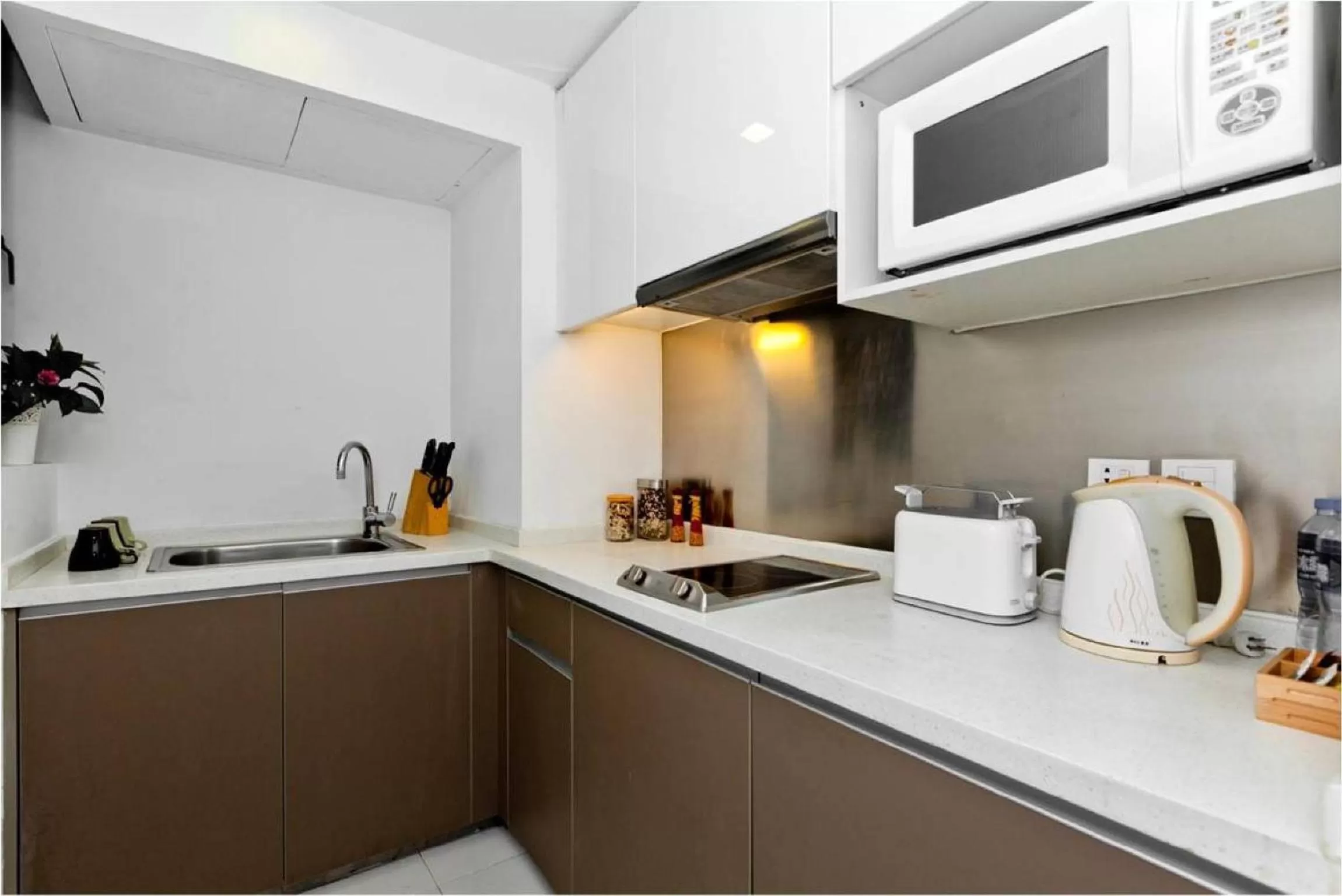 Kitchen or kitchenette in Citadines Xinghai Suzhou