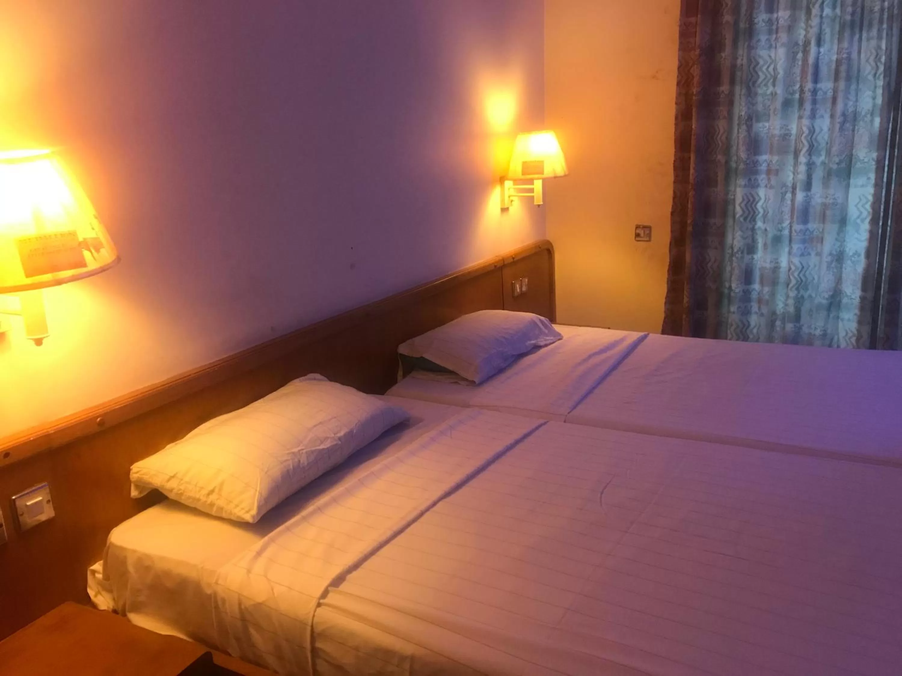 Bed in Maple Leaf Korean Hotel