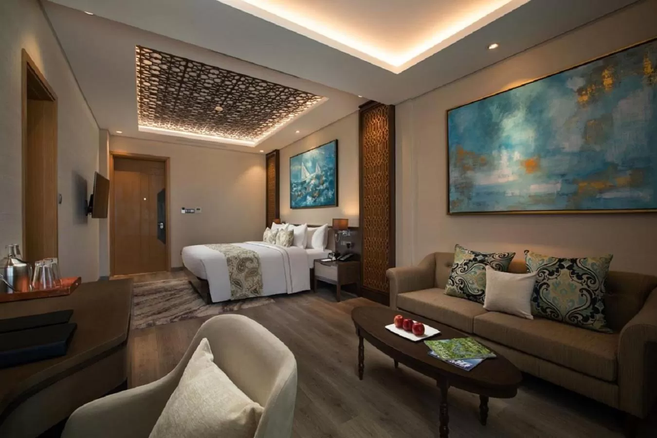 Living room, Bed in Wyndham Grand KN Paradise Cam Ranh