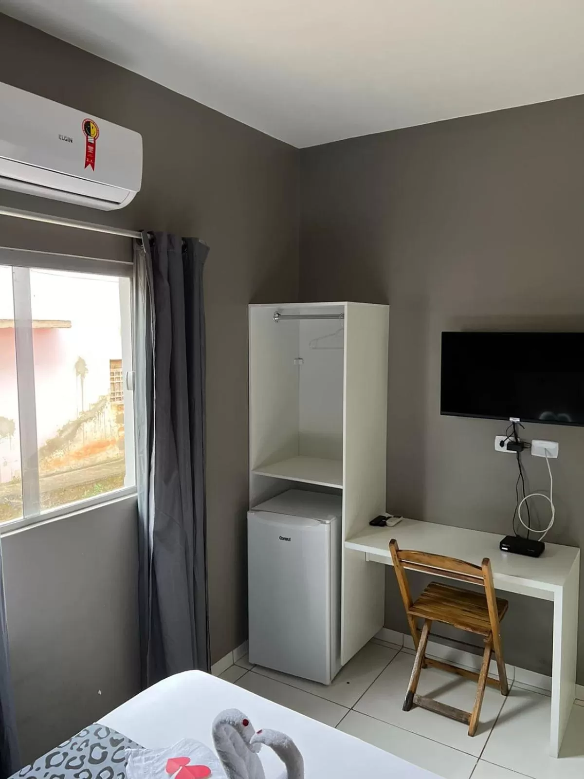 TV/Entertainment Center in Pousada Praia Bela