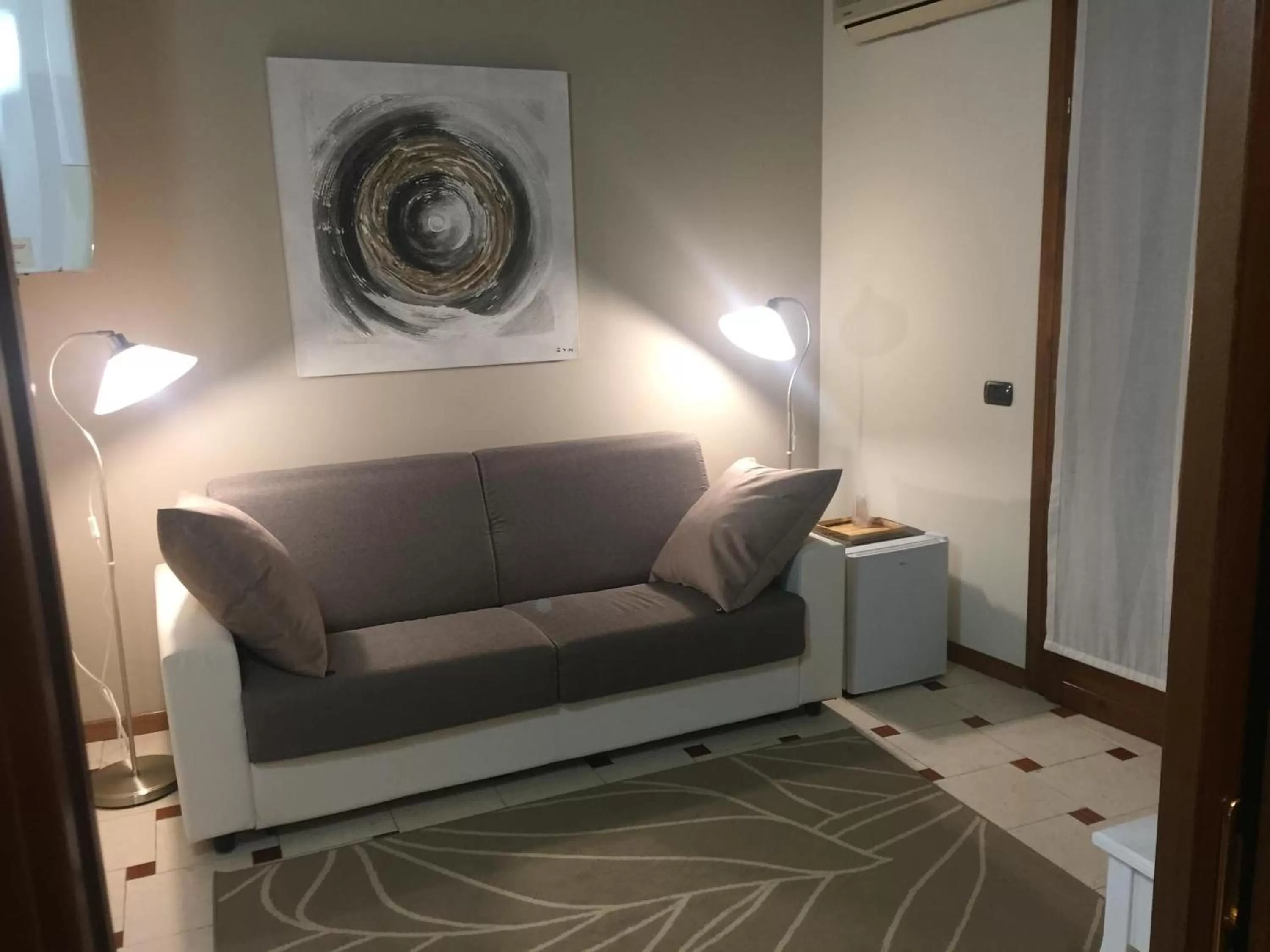 Bed, Seating Area in B&B Via Garibaldi