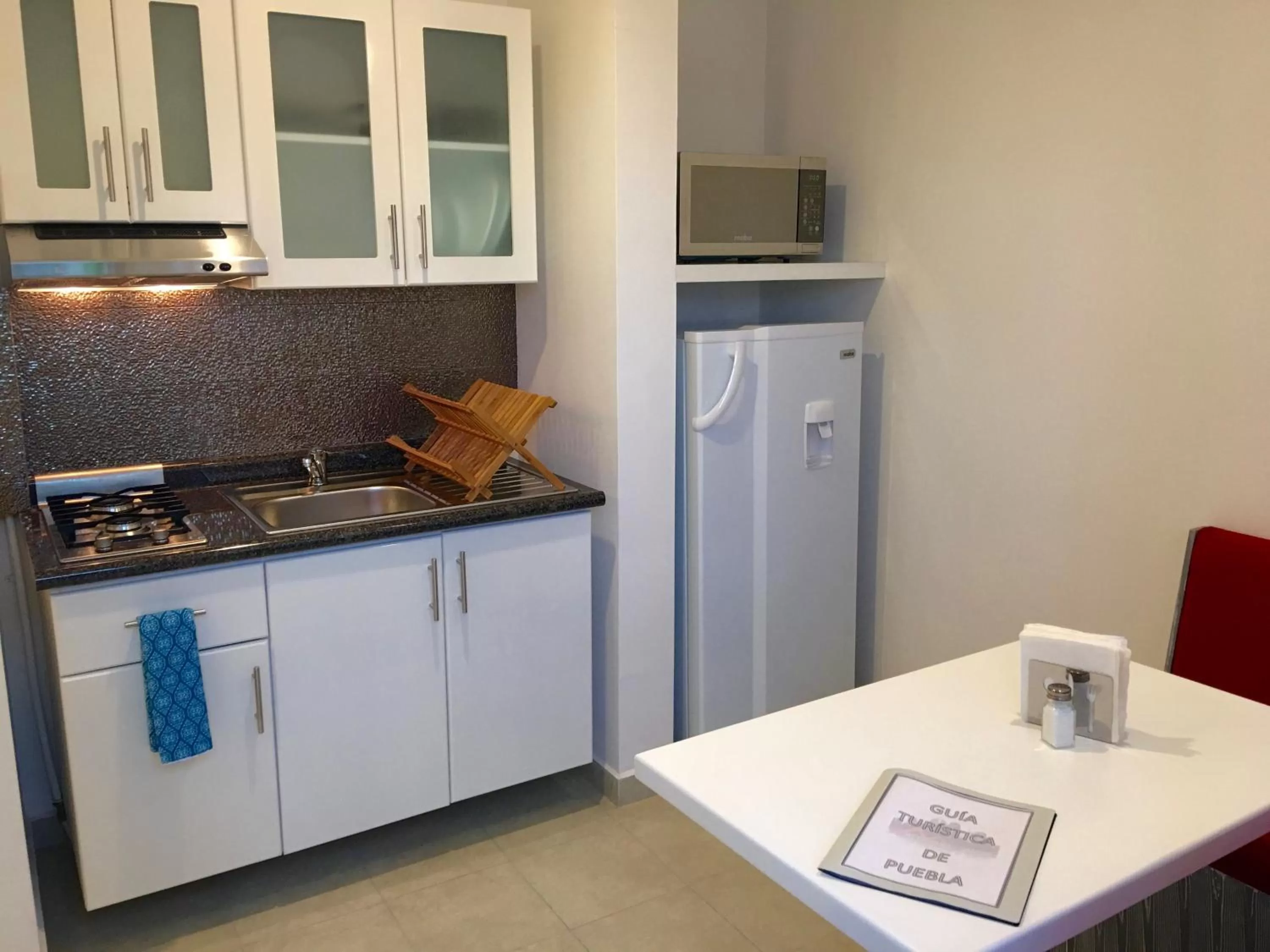 Kitchen or kitchenette in Herbal Inn Suites